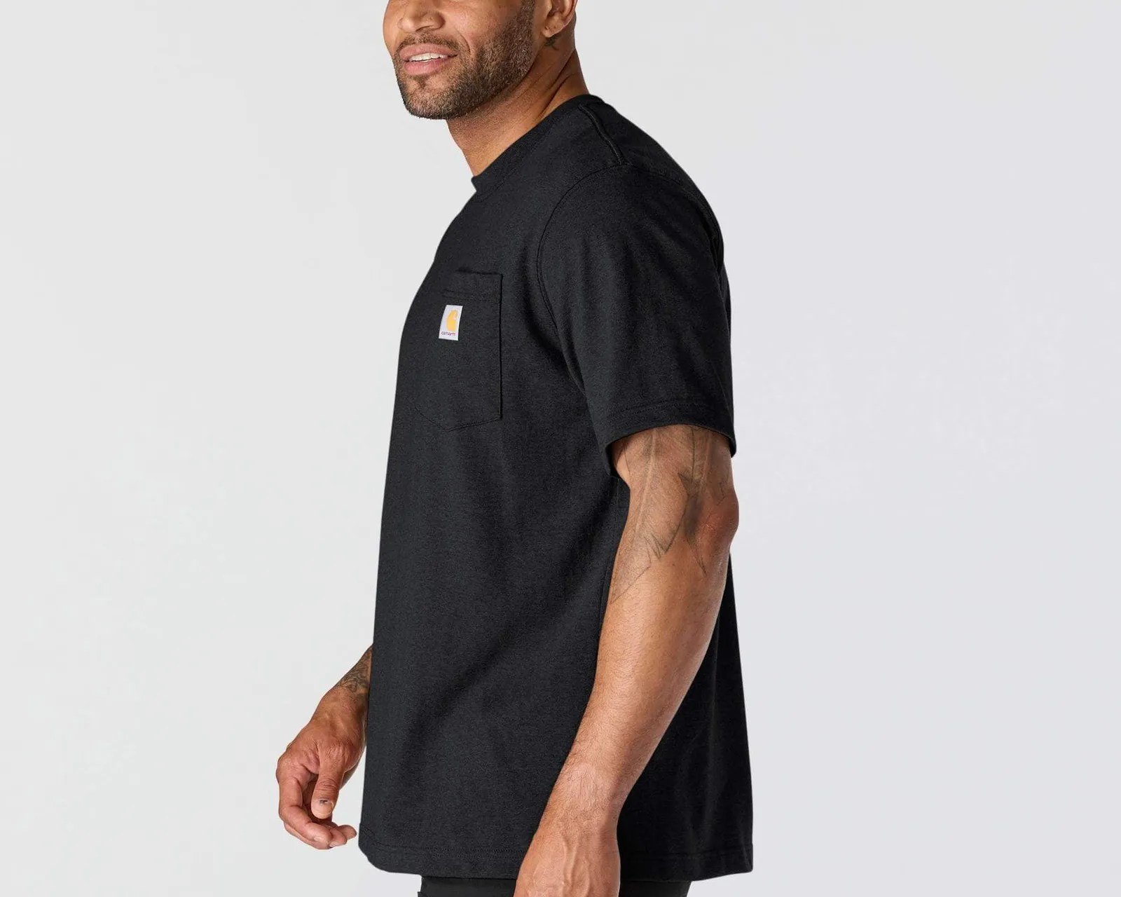 Black short-sleeve Carhartt T-shirt with chest pocket worn by a person.
