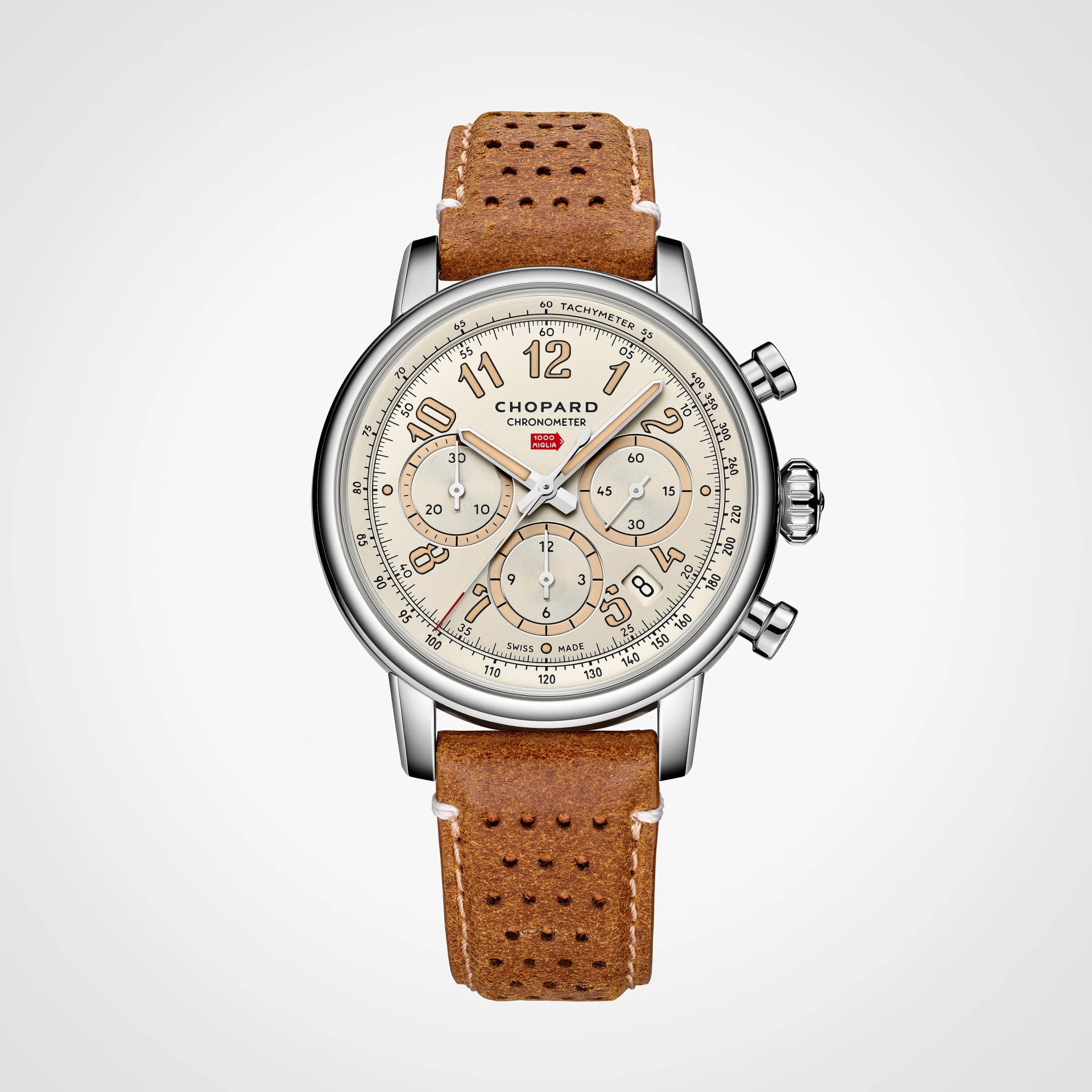 Silver Chopard chronometer watch with beige dial, three subdials, tachymeter scale, and perforated brown leather strap.