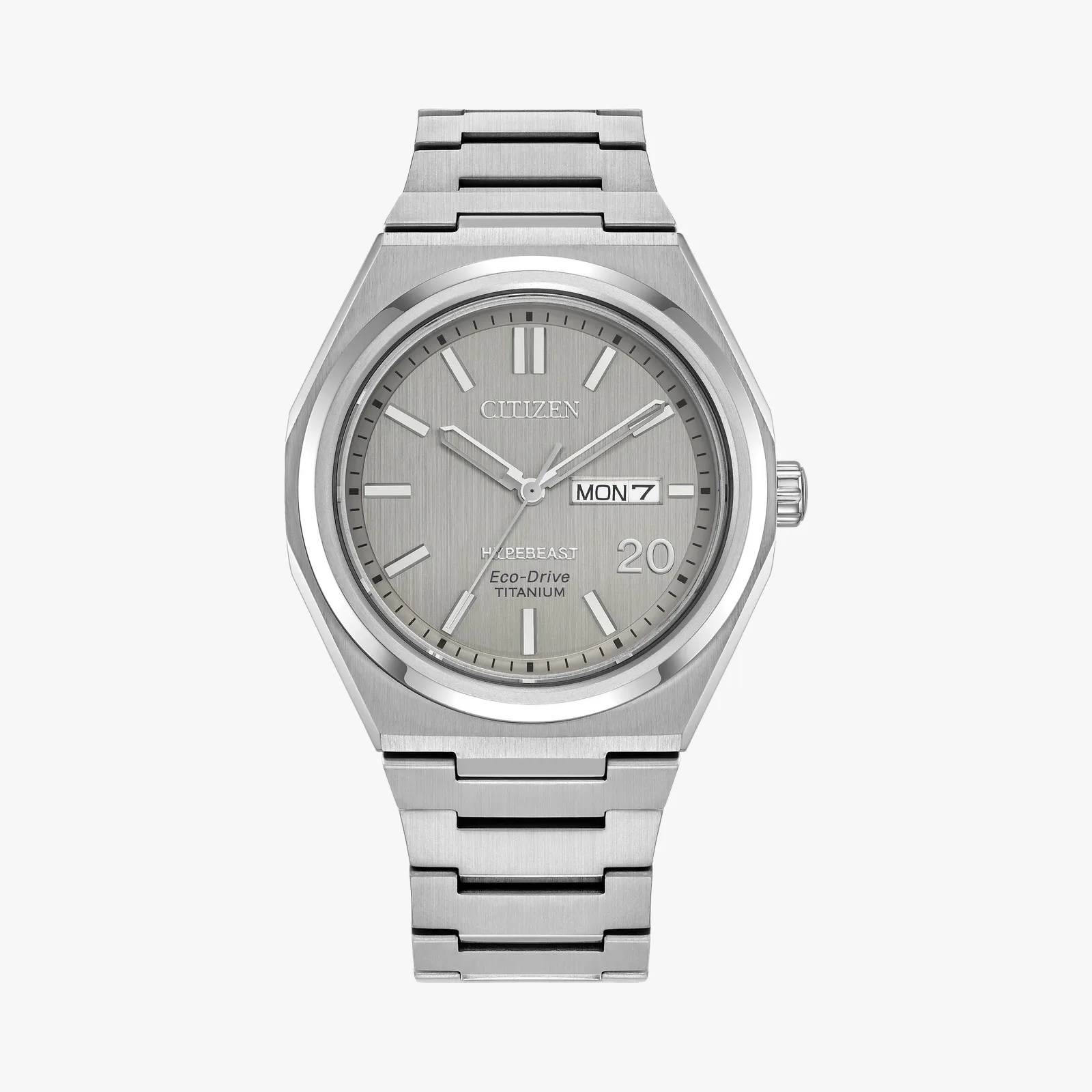 Silver Citizen Eco-Drive titanium wristwatch with day-date display and brushed metal bracelet.