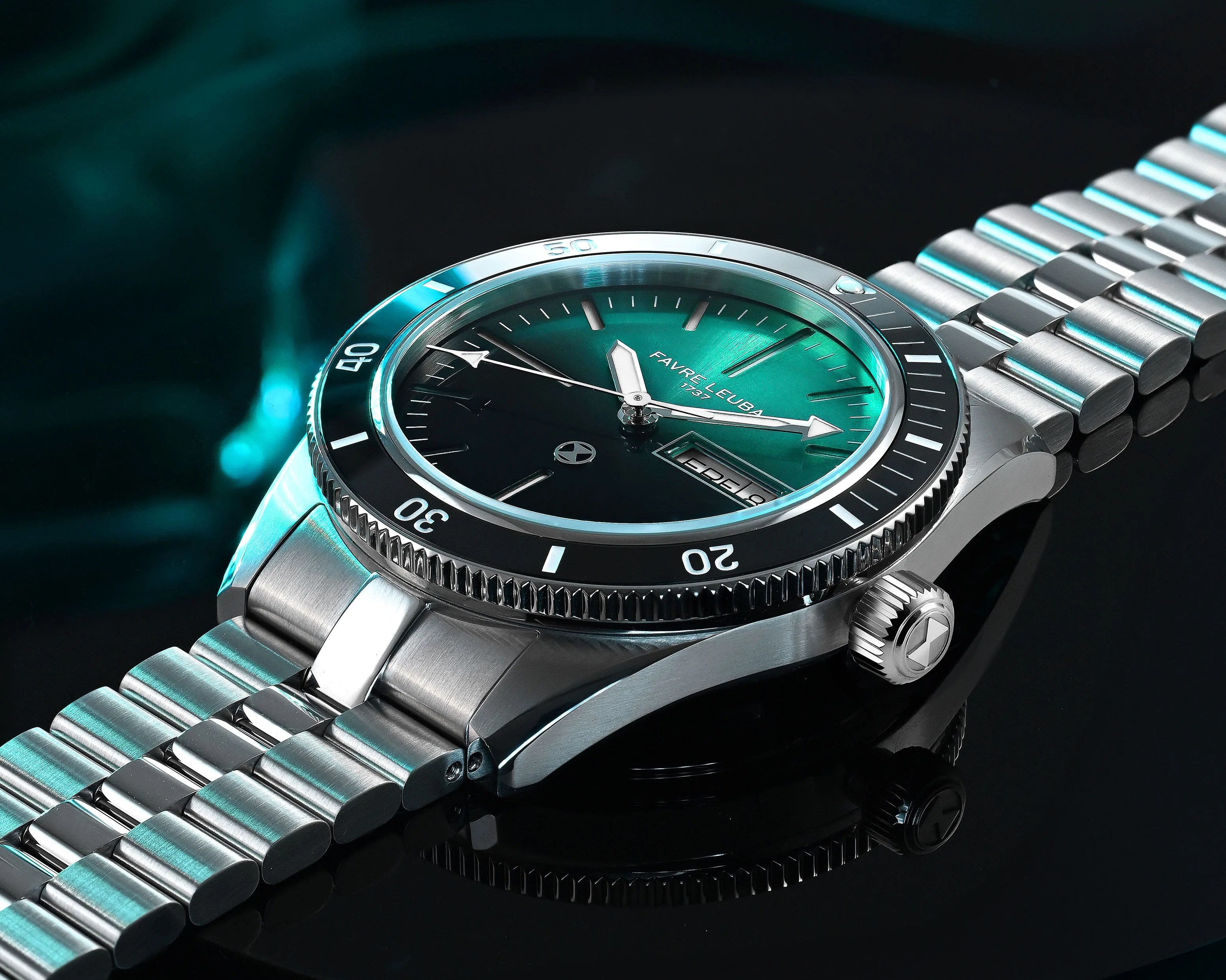 Stainless steel Favre Leuba wristwatch with green dial and black bezel on a reflective black surface.