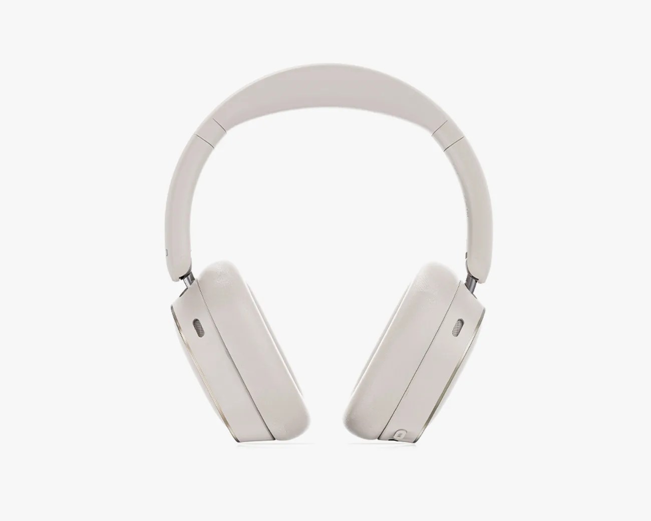 Over-ear wireless headphones in light beige with cushioned ear cups and adjustable headband.