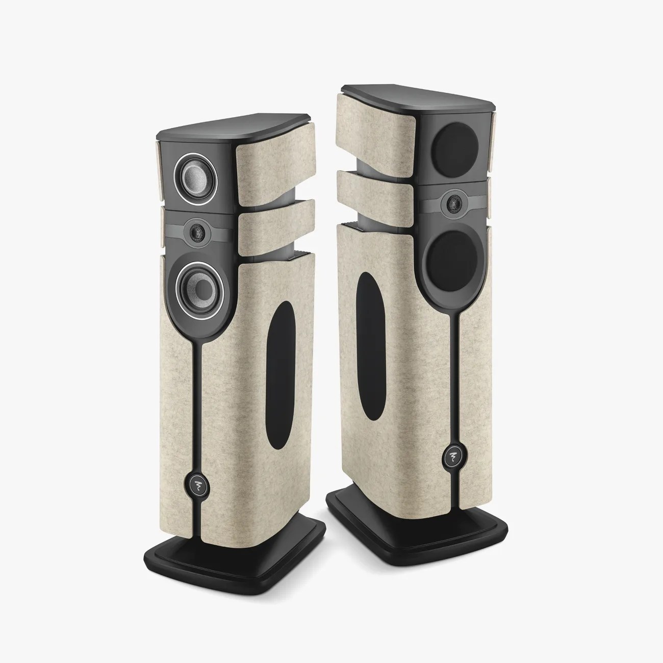 Pair of tall, beige fabric-covered floor-standing speakers with black bases and visible drivers.
