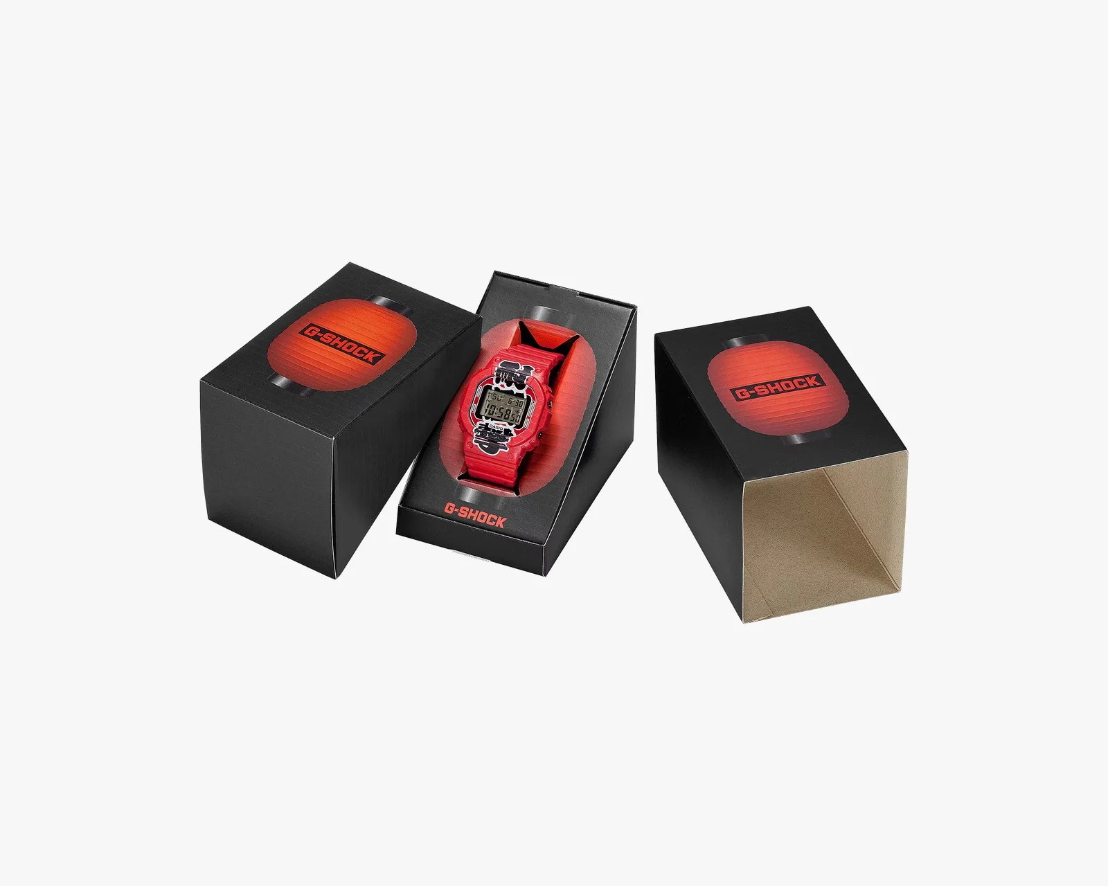 Red digital G-Shock watch with black and white design in black packaging featuring a red lantern graphic and G-Shock logo.