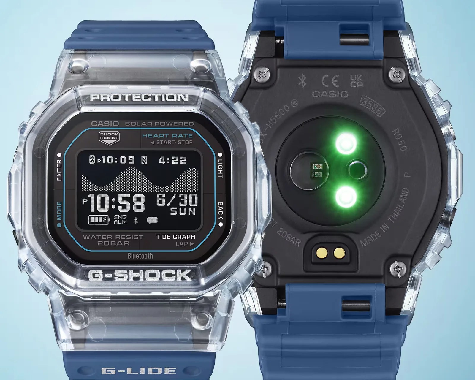 Transparent Casio G-Shock G-Lide watch with blue strap showing front digital display and back with heart rate sensor lights on.