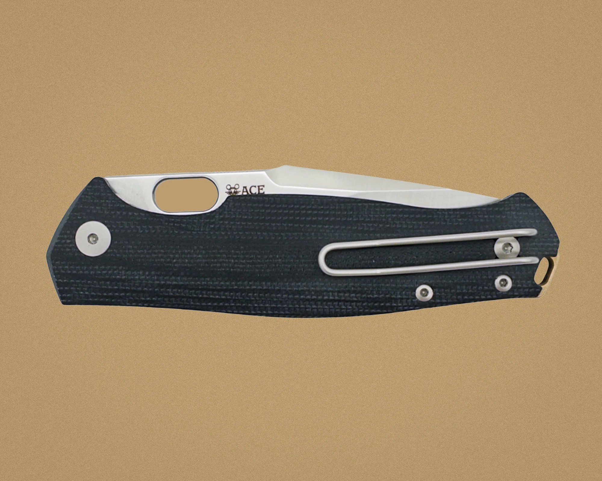 Black textured folding knife handle with silver clip and partially visible silver blade marked "ACE.