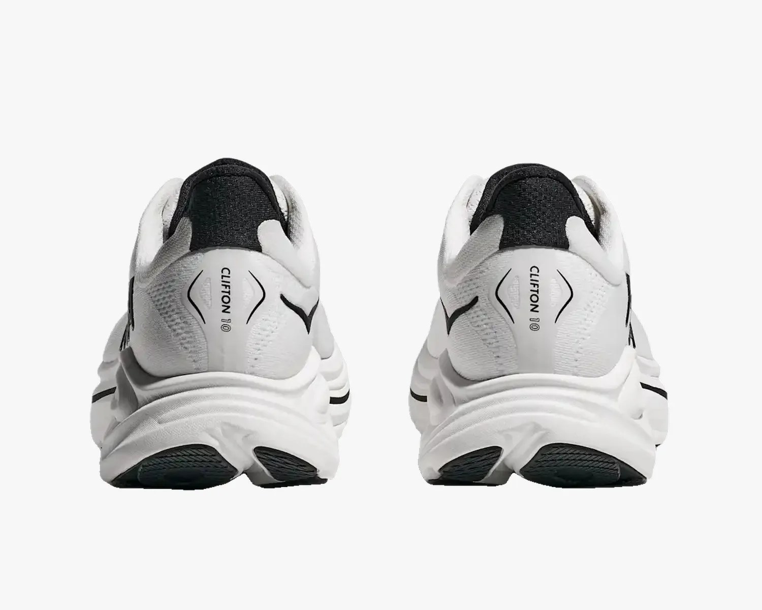 Pair of white and black Mizuno Clifton 10 running shoes shown from the back.