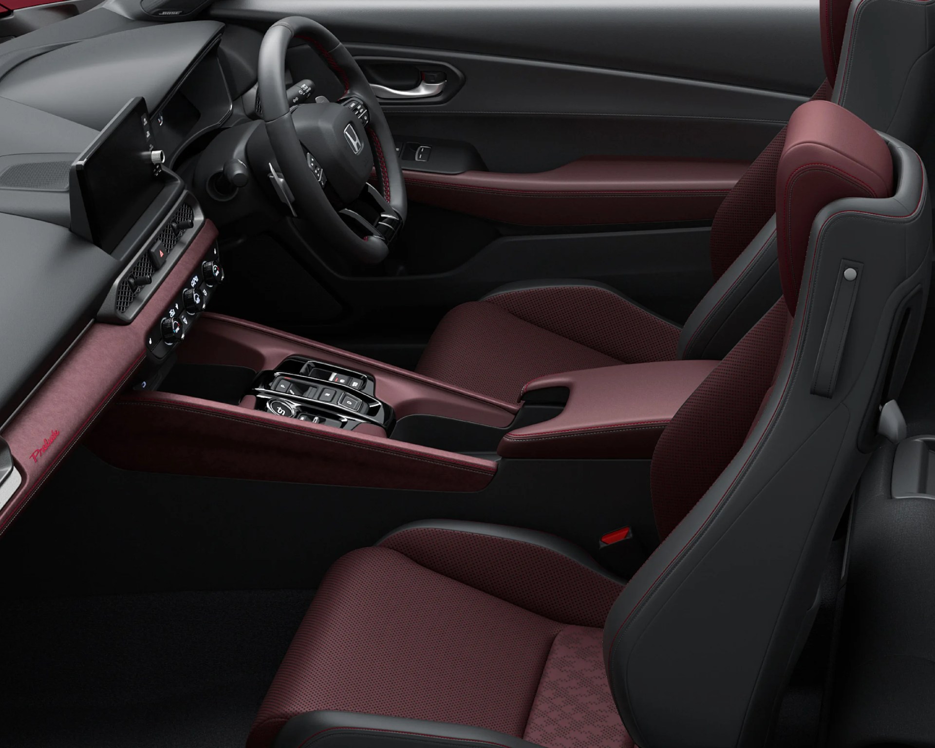Car interior with black and burgundy leather seats, black steering wheel with Honda logo, and touchscreen display on dashboard.