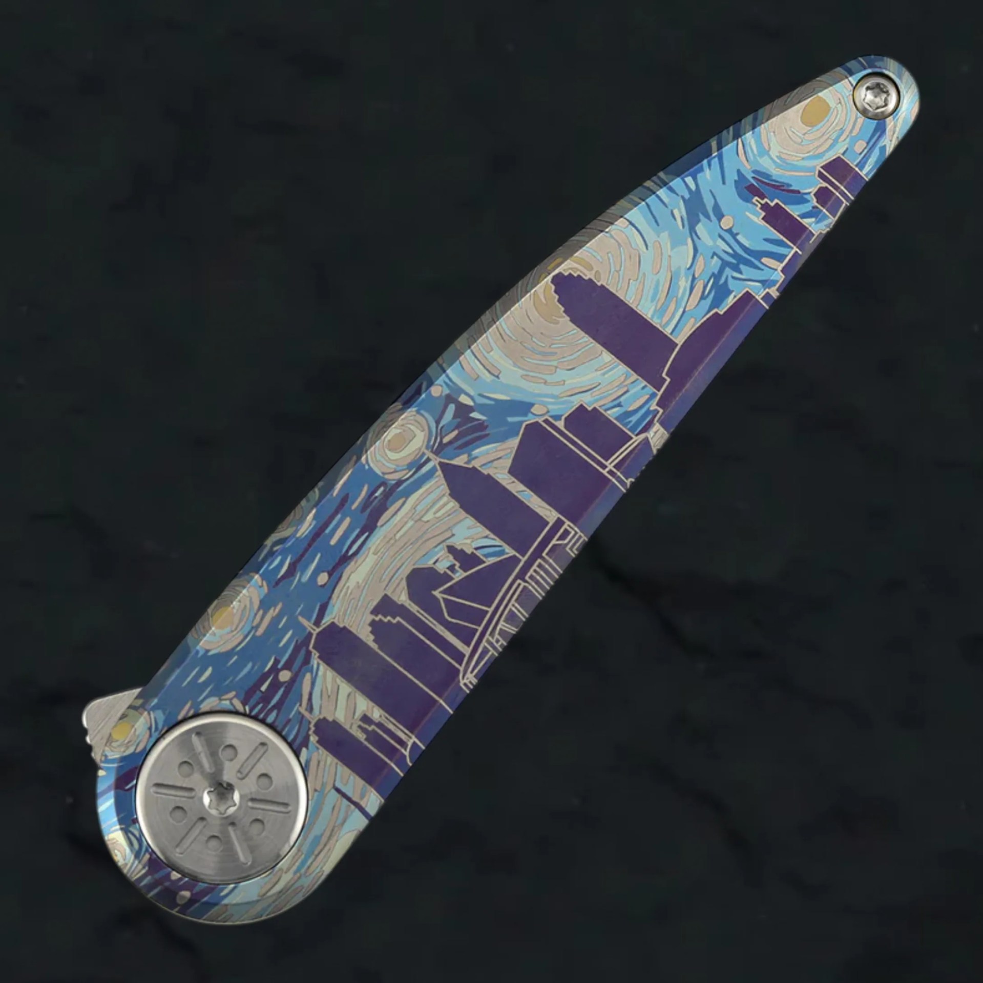 Blue and purple folding knife handle with a city skyline design and metal screws.