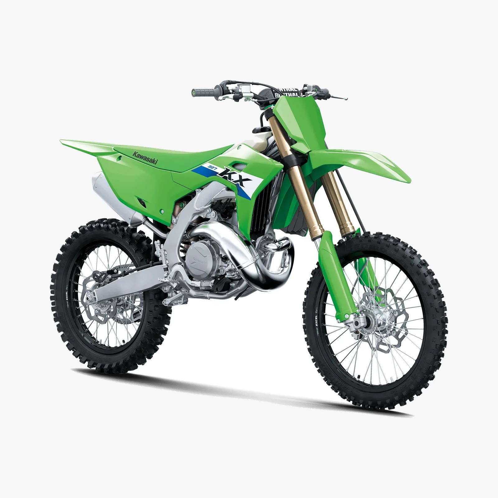 Green Kawasaki KX 327 dirt bike with knobby tires and gold front suspension forks.