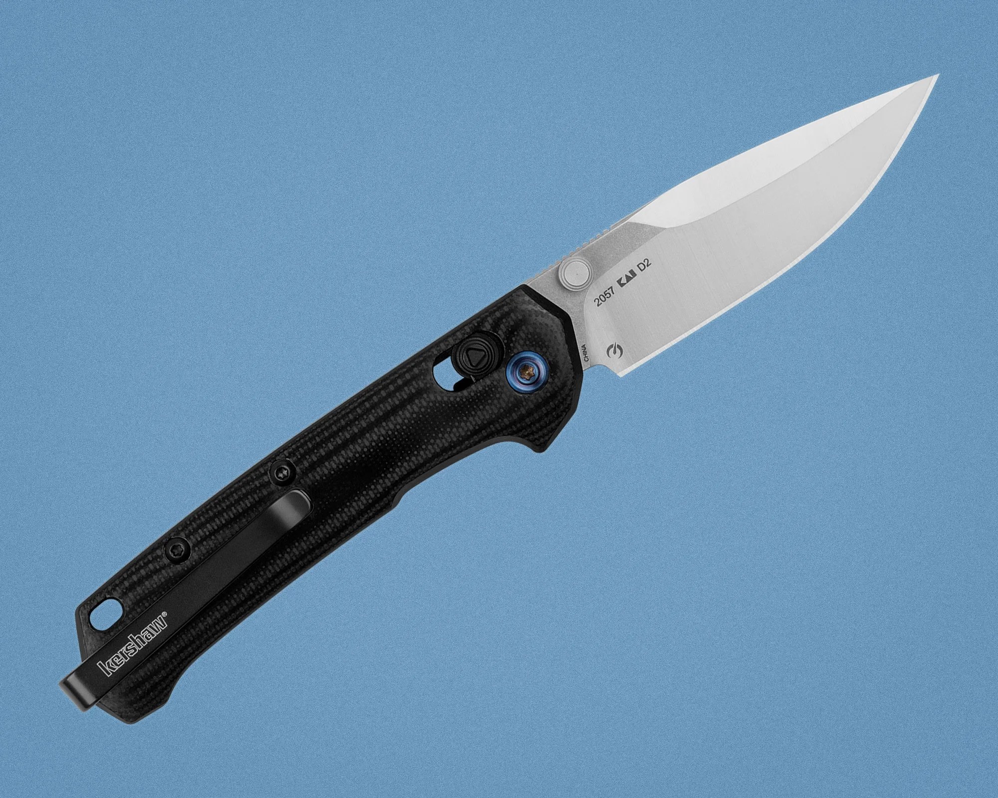 Folding knife with a silver blade marked "2057 KAI D2" and a black textured handle with a clip.