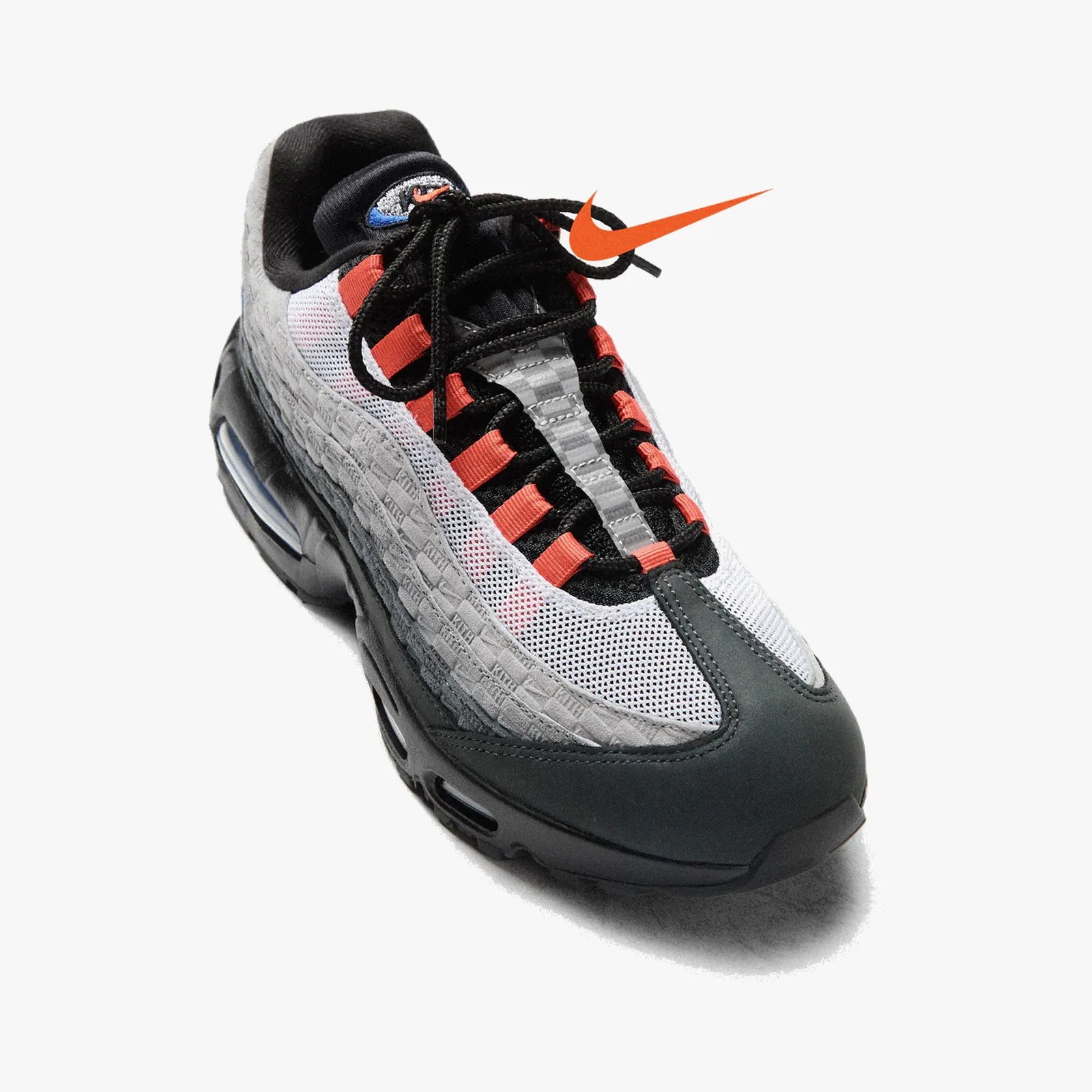Black, white, and red Nike Air Max sneaker with visible air cushion and black laces.
