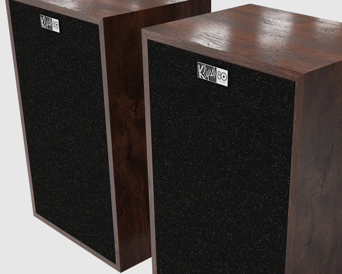 Pair of Klipsch vintage-style speakers with dark wood finish and black fabric grilles.