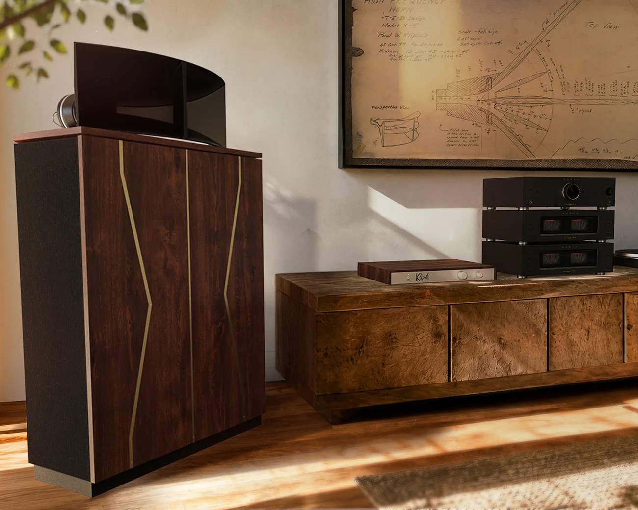 Large vintage-style wooden speaker with a curved black horn on top, next to a wooden cabinet holding black audio equipment.