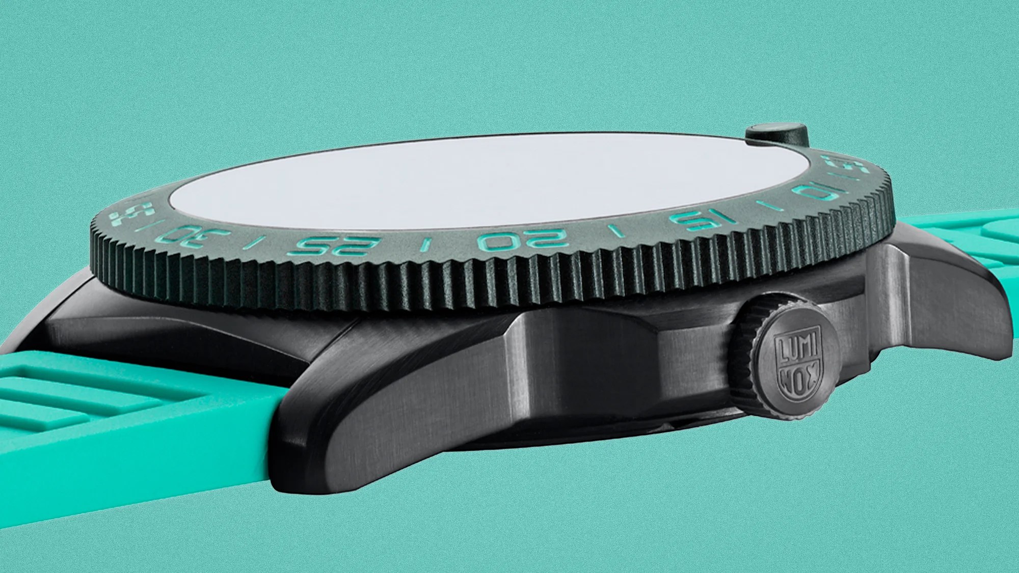 Black watch case with a rotating bezel marked in turquoise numbers and a turquoise rubber strap.