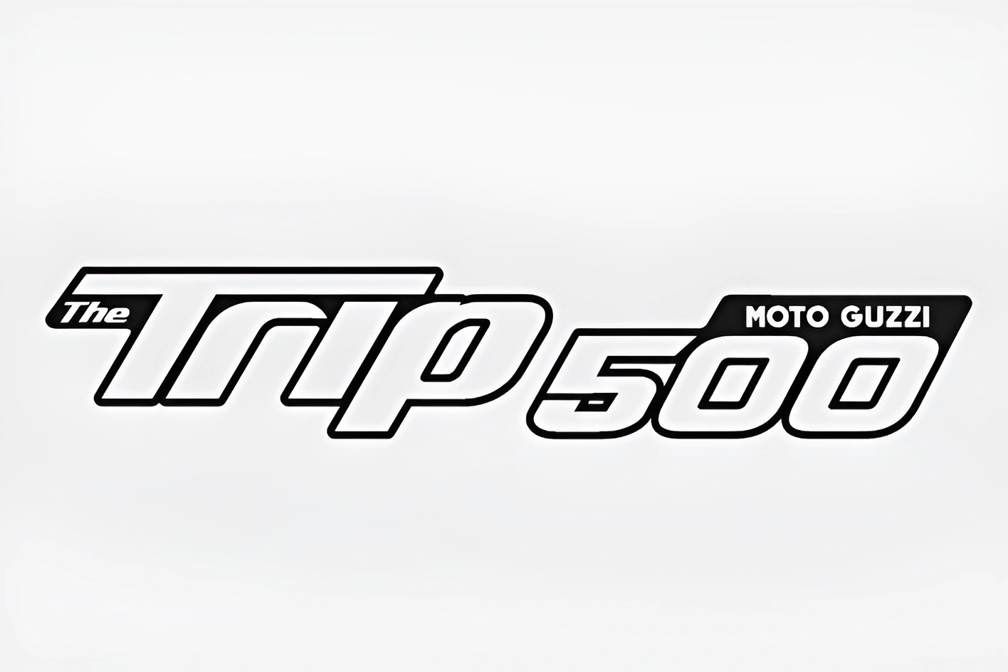 Black and white "The Trip 500 MOTO GUZZI" logo on a white background.