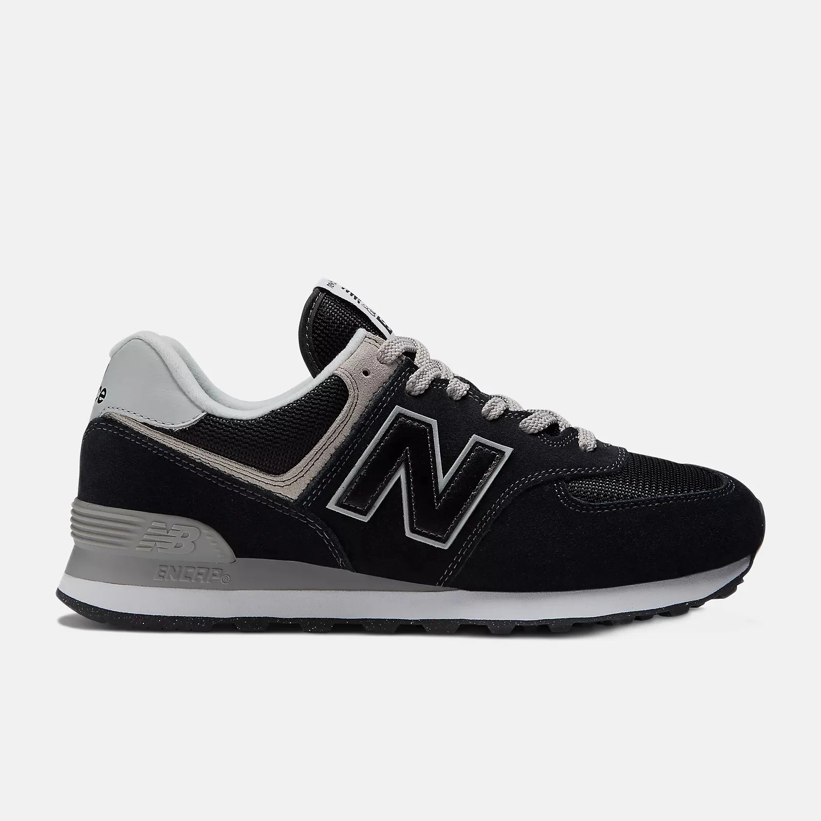 Black and gray New Balance sneaker with mesh and suede upper and gray laces.