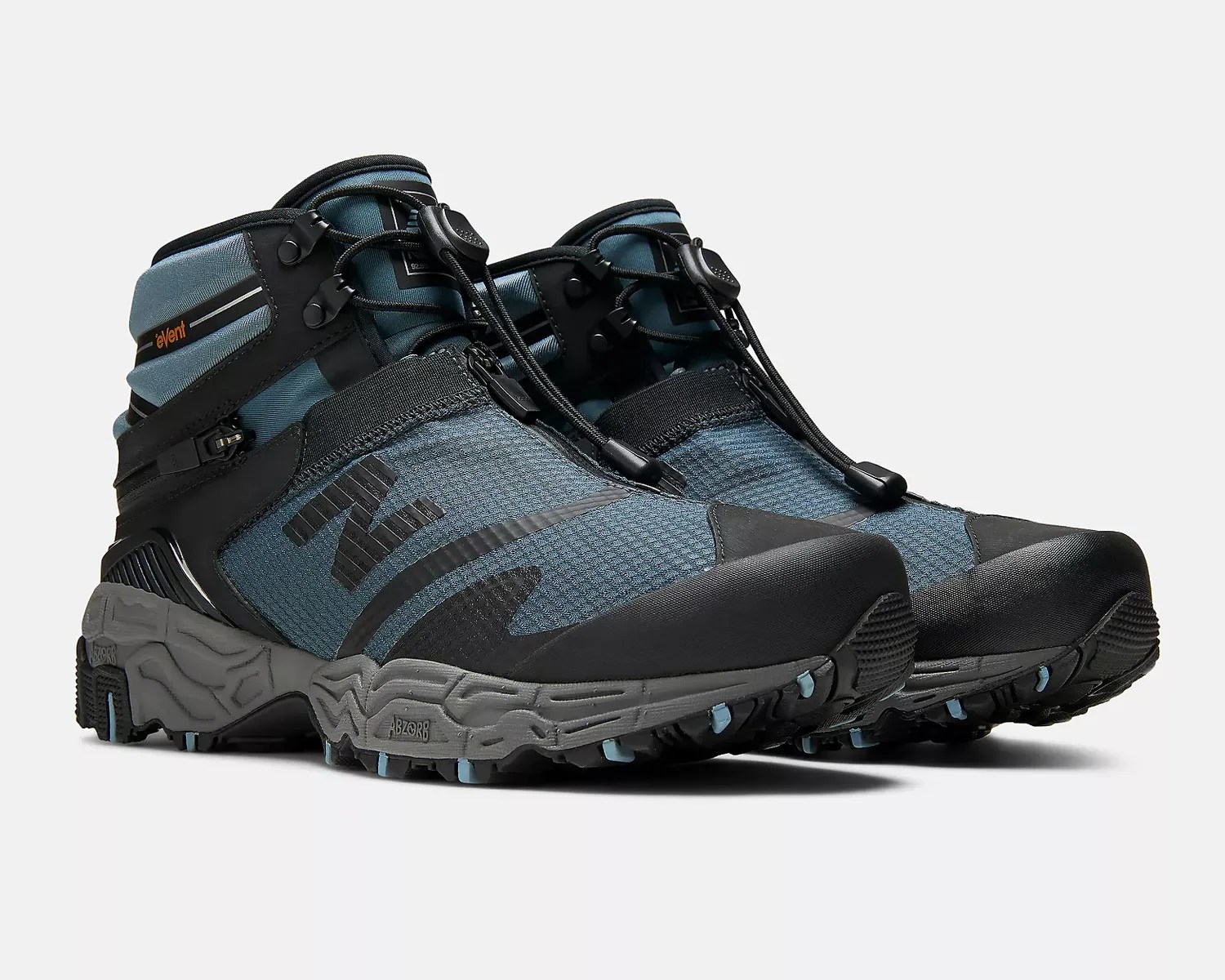 Pair of blue and black New Balance hiking shoes with gray soles and quick-lace system.