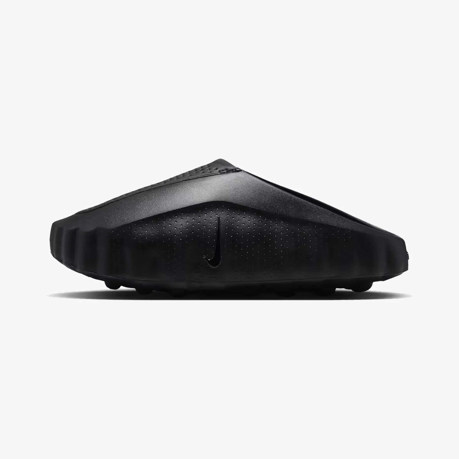 Black Nike slide sandal with textured sole and small perforations on the side.