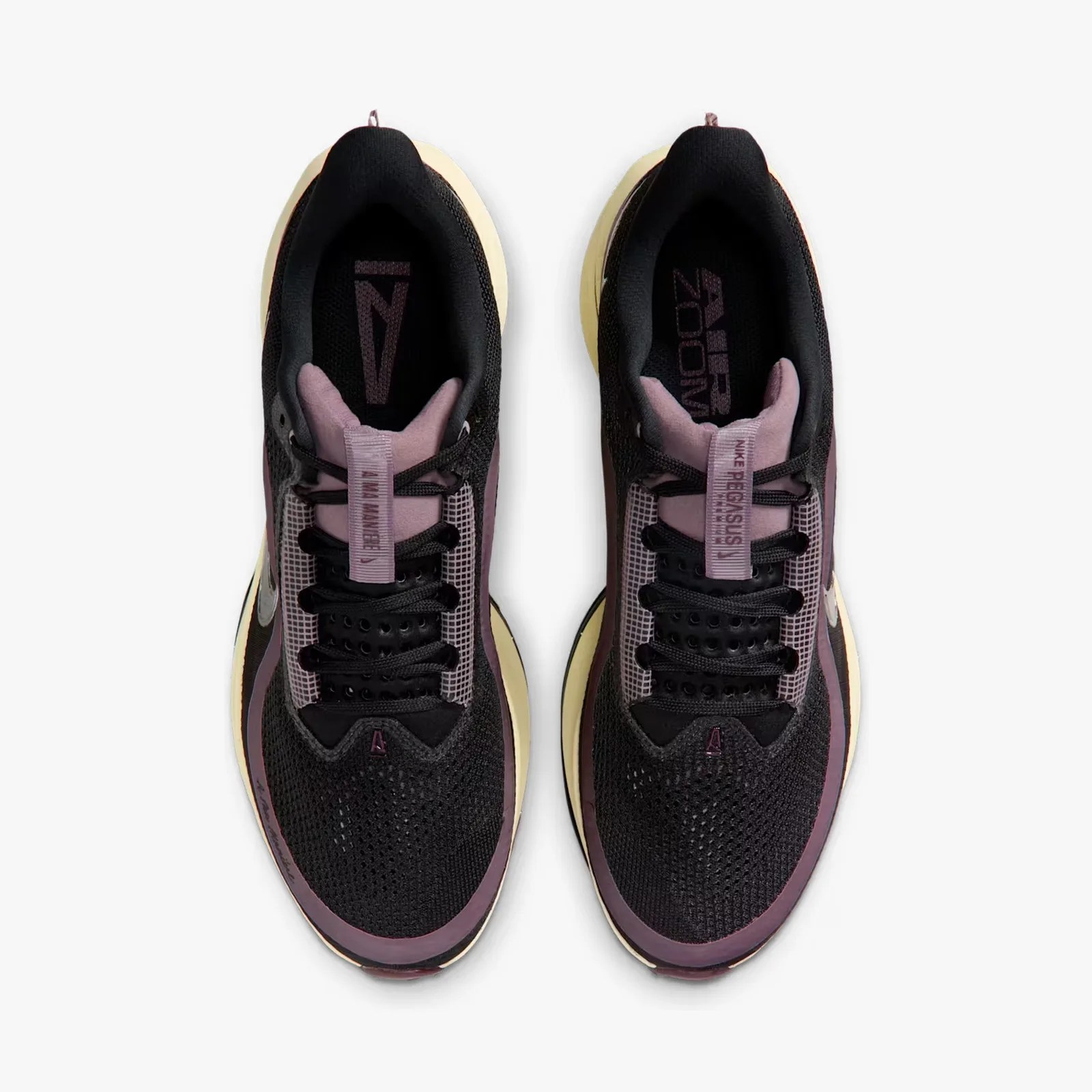 Pair of black and mauve Nike Pegasus running shoes viewed from above on a white background.