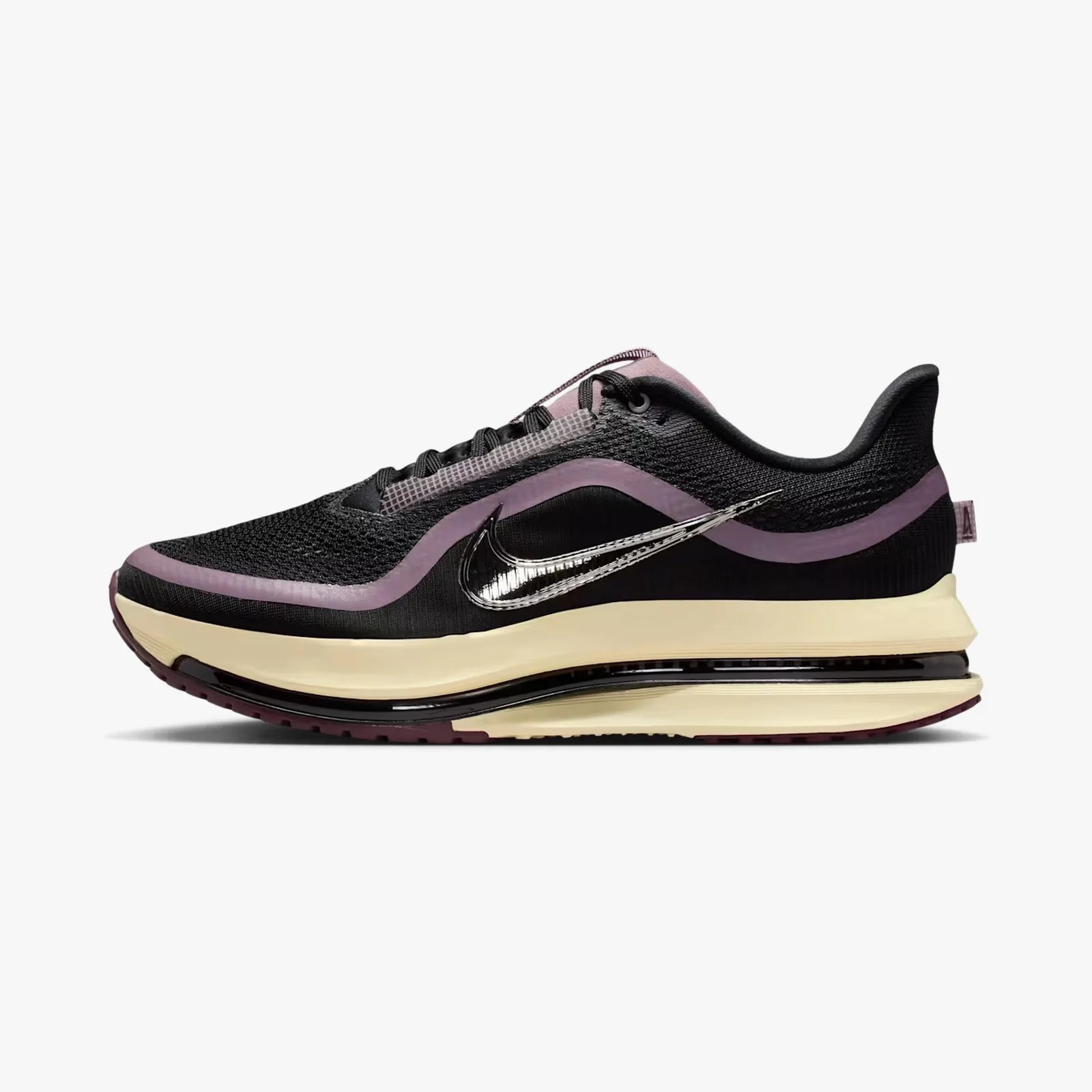 Black and purple Nike running shoe with cream midsole and visible air cushioning.
