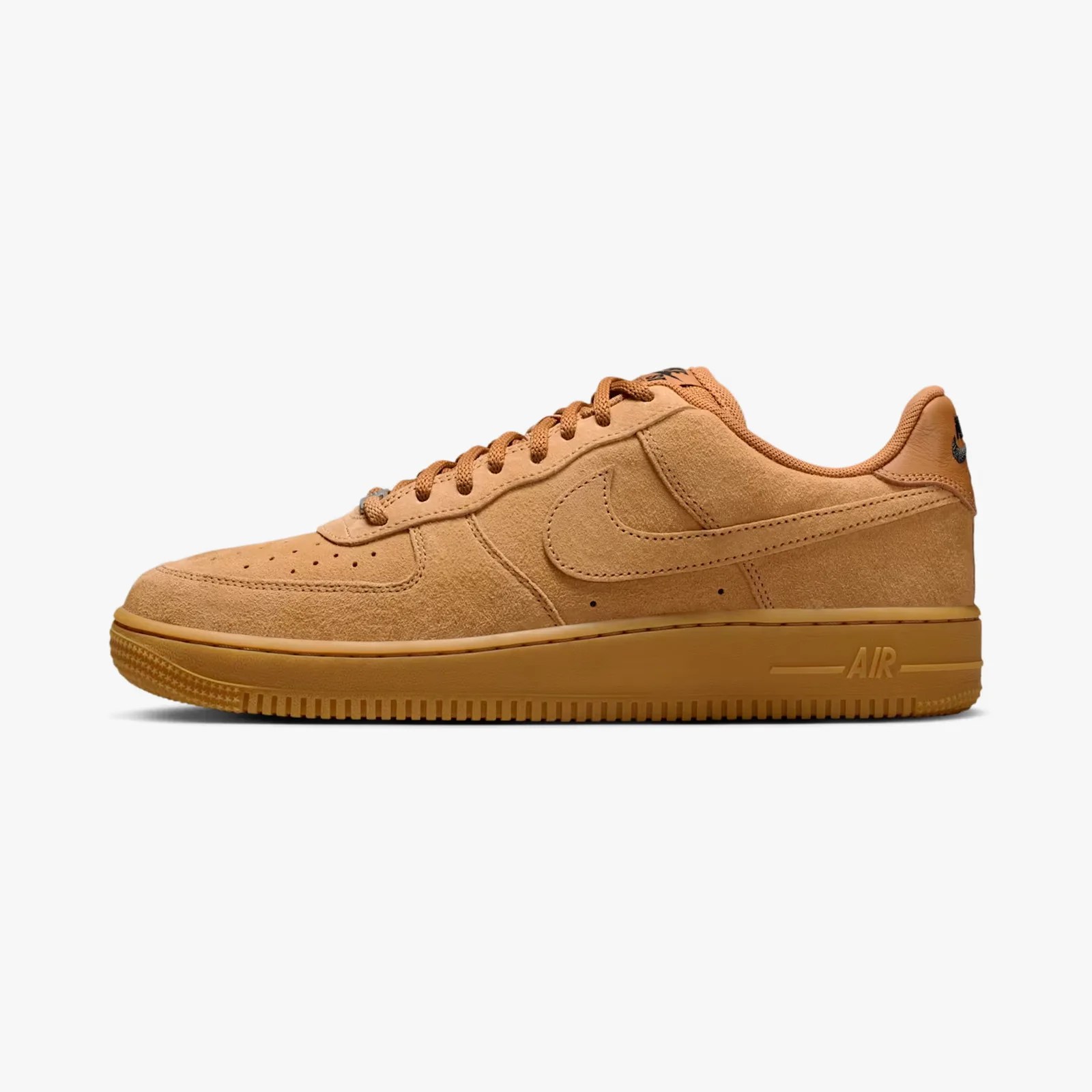 Tan suede Nike Air Force 1 sneaker with gum sole and matching laces.