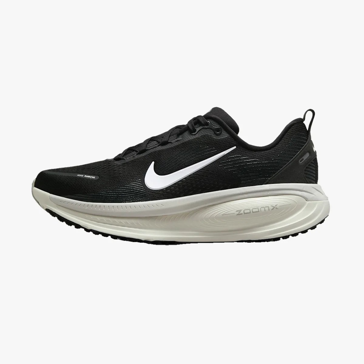 Black Nike running shoe with white swoosh logo and thick white ZoomX sole.
