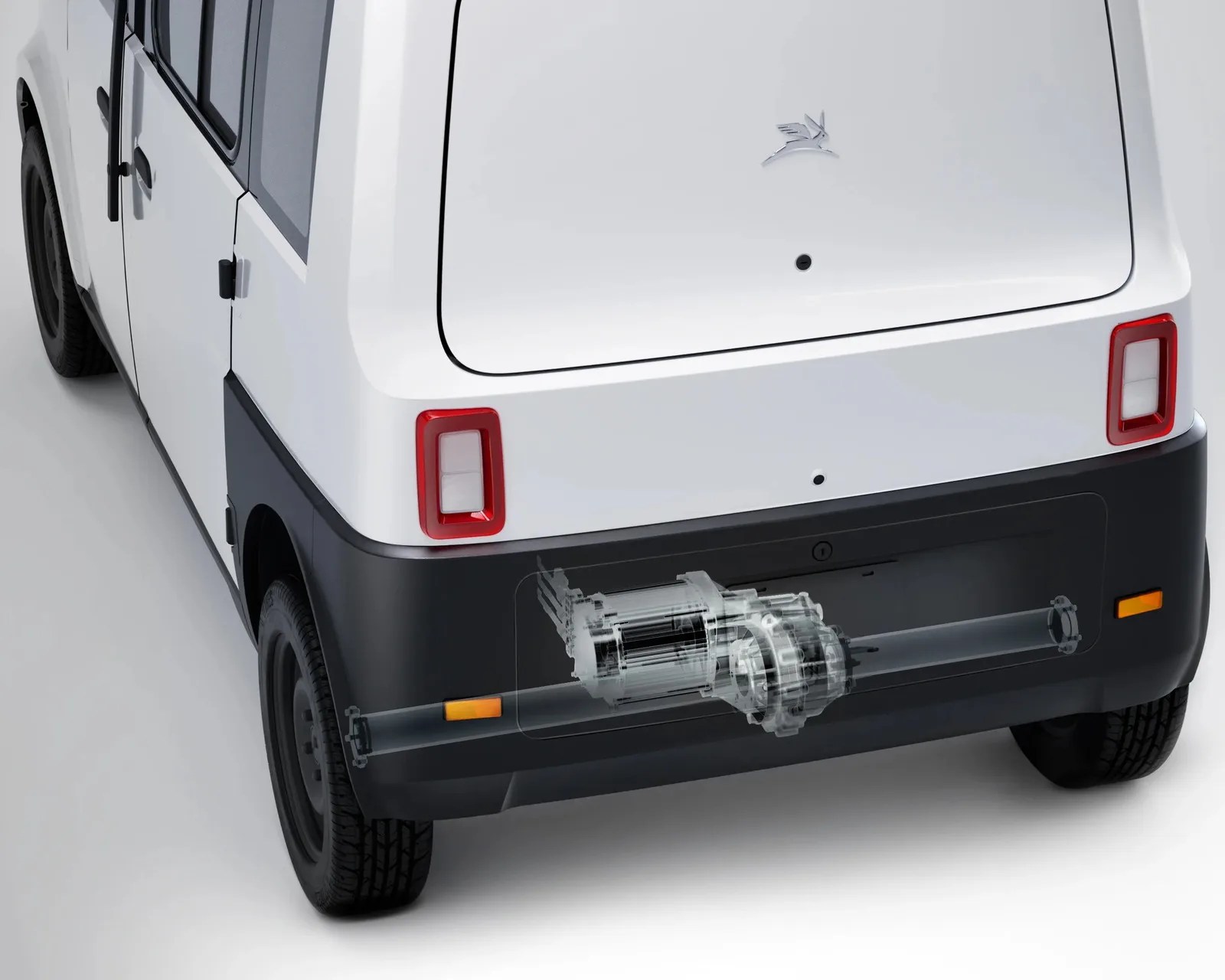 Rear view of a white compact vehicle with black bumper showing a transparent overlay of its drivetrain components.