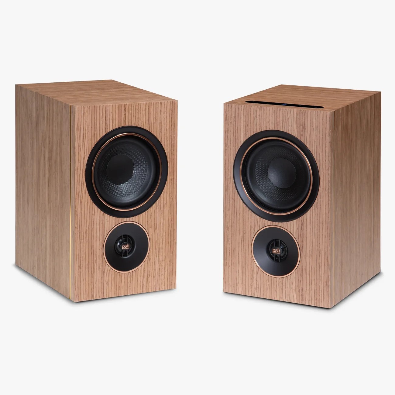 Pair of rectangular wooden bookshelf speakers with black and copper-trimmed drivers.