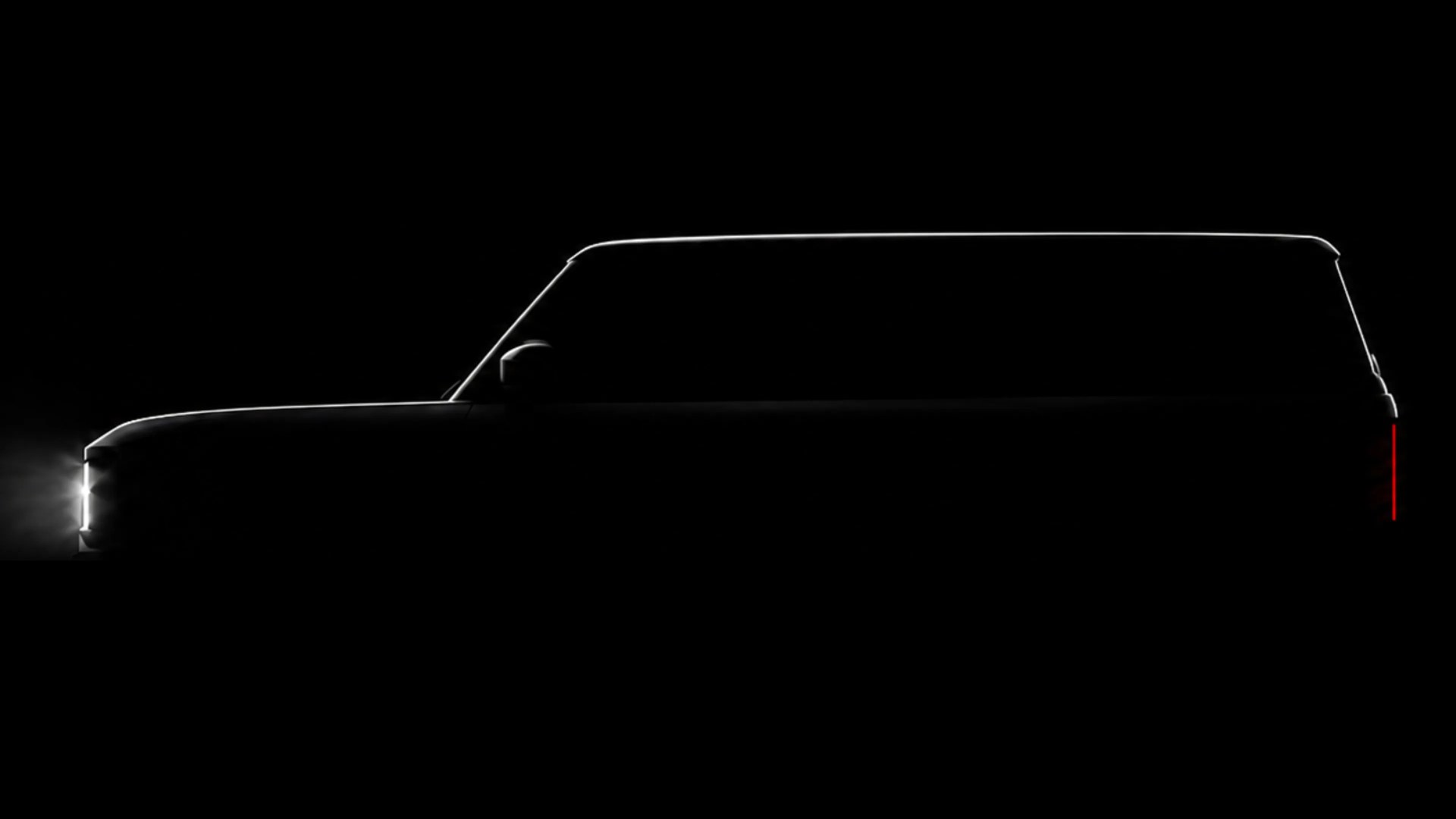 Silhouette of a boxy SUV with illuminated front and rear vertical lights against a black background.