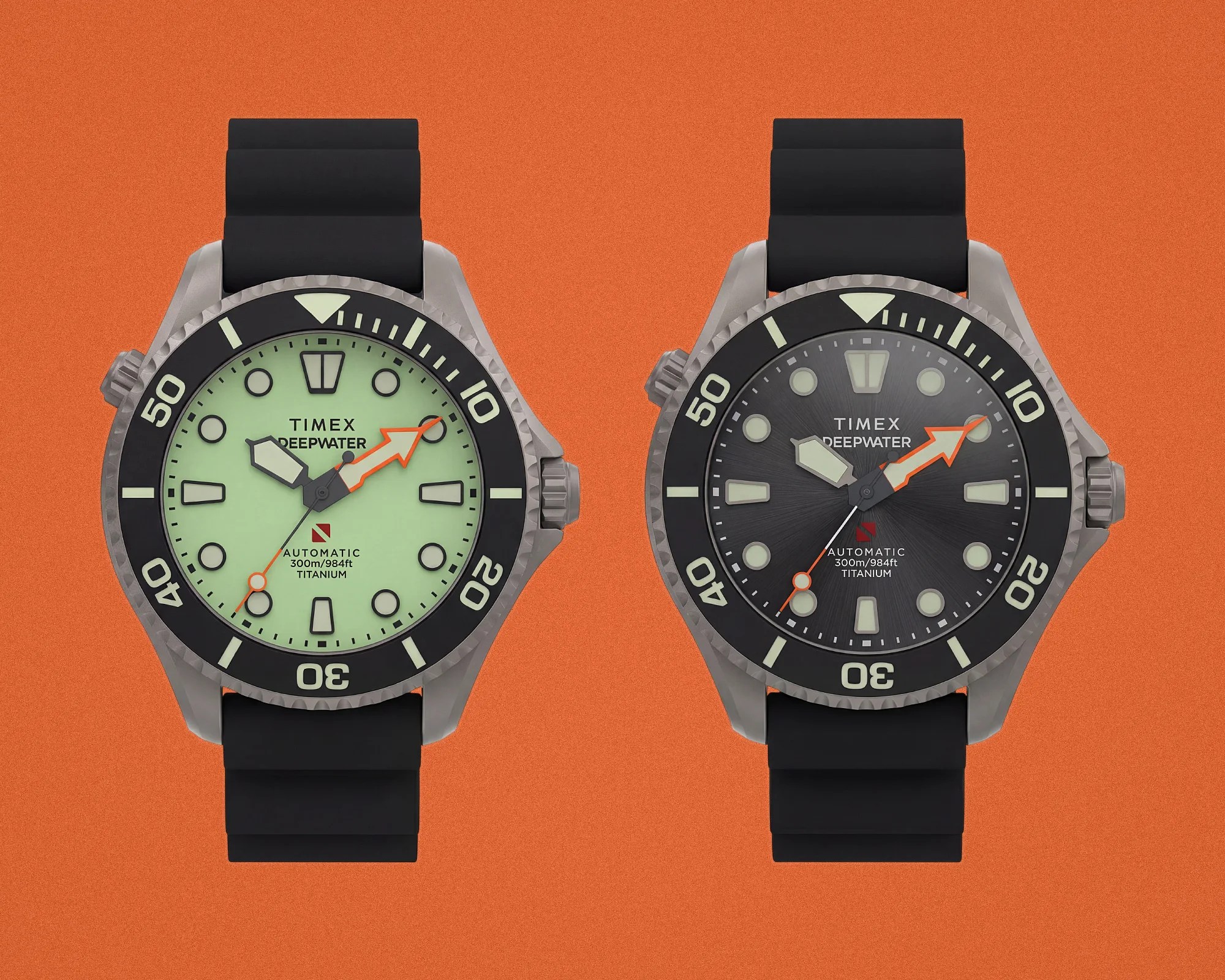 Two Timex Deepwater automatic titanium dive watches with black rubber straps, one with a green dial and the other with a black dial, on an orange background.