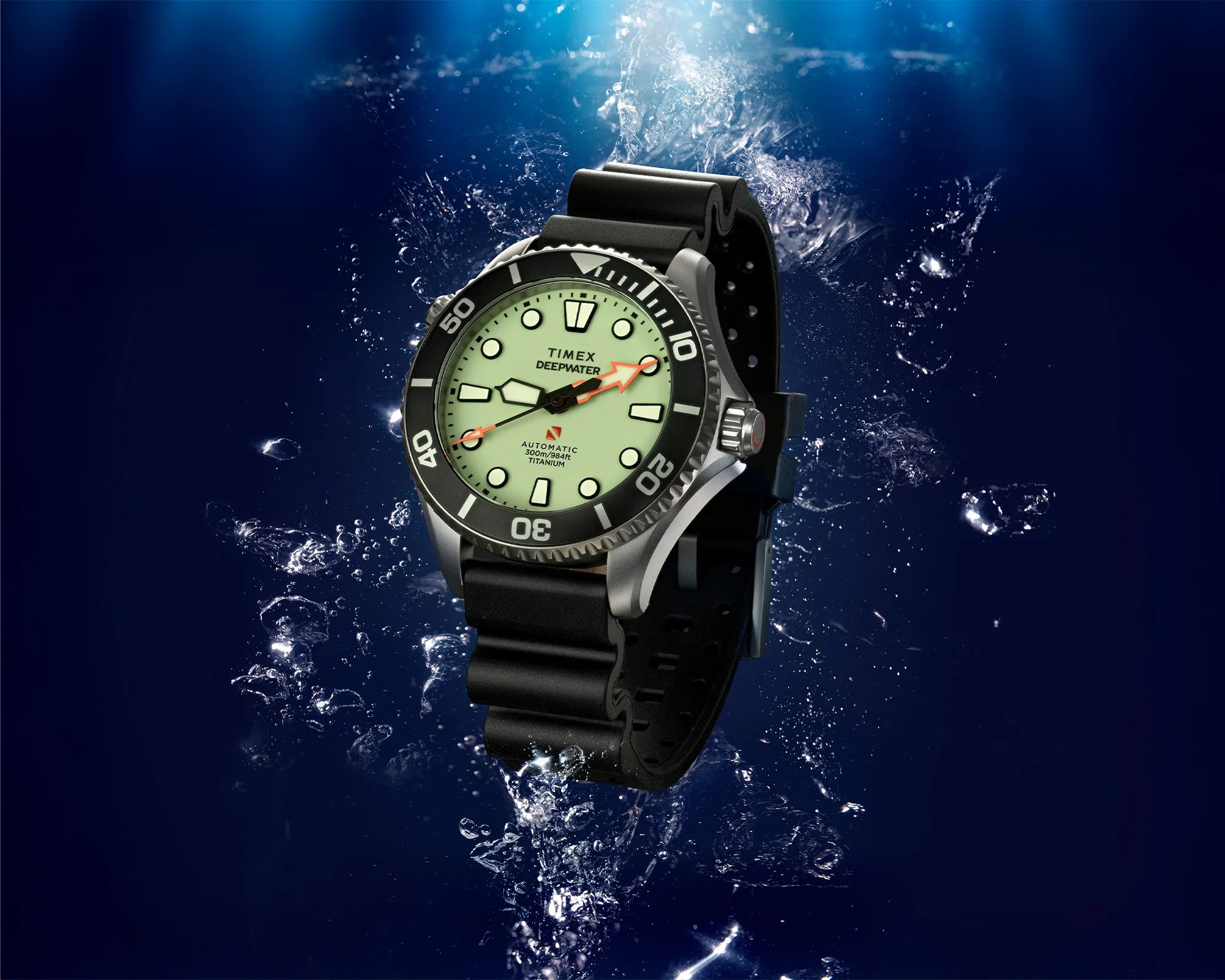 Timex Deepwater automatic titanium dive watch with black bezel and strap underwater with bubbles.