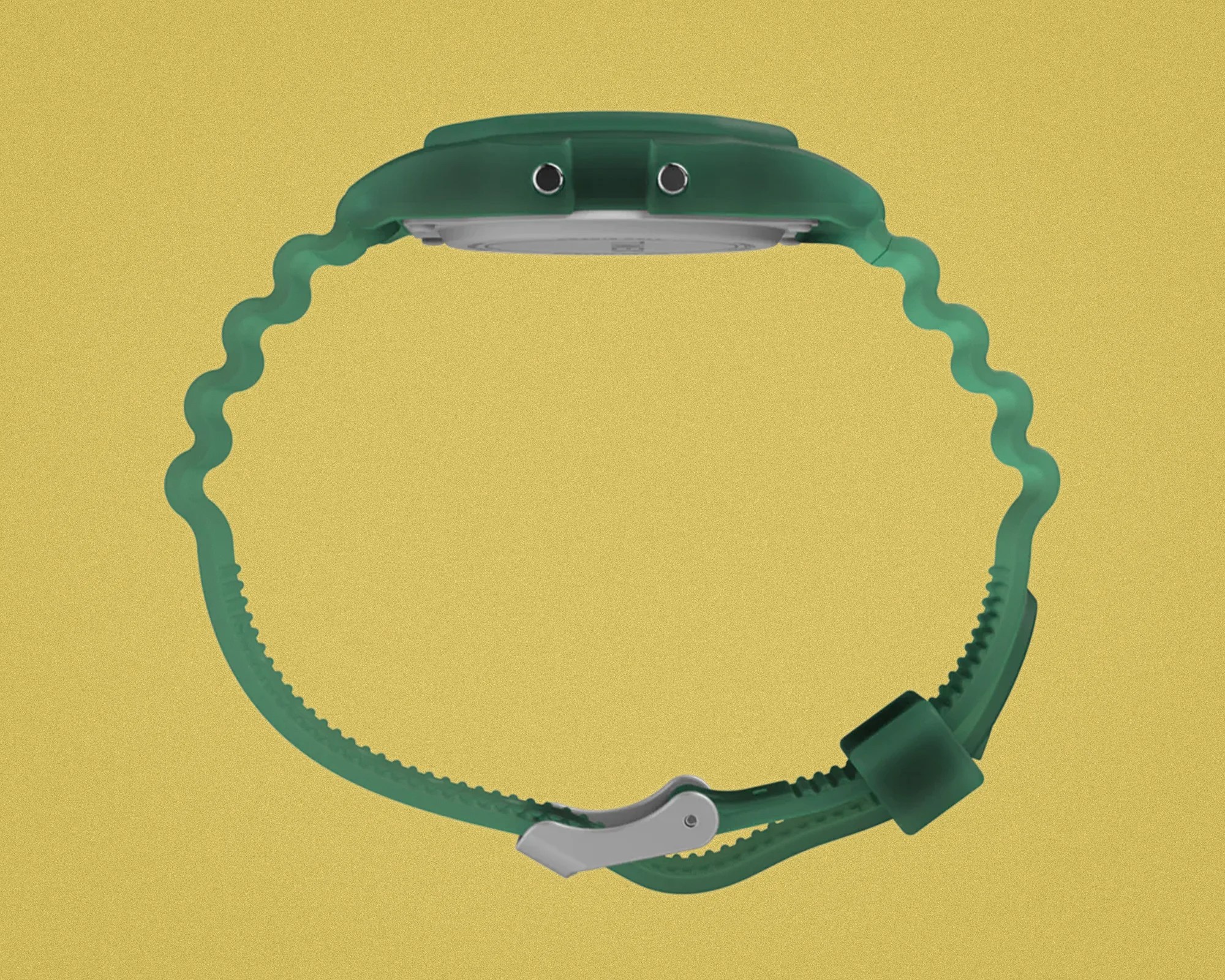 Green wristwatch with a wavy silicone strap and silver buckle on a yellow background.