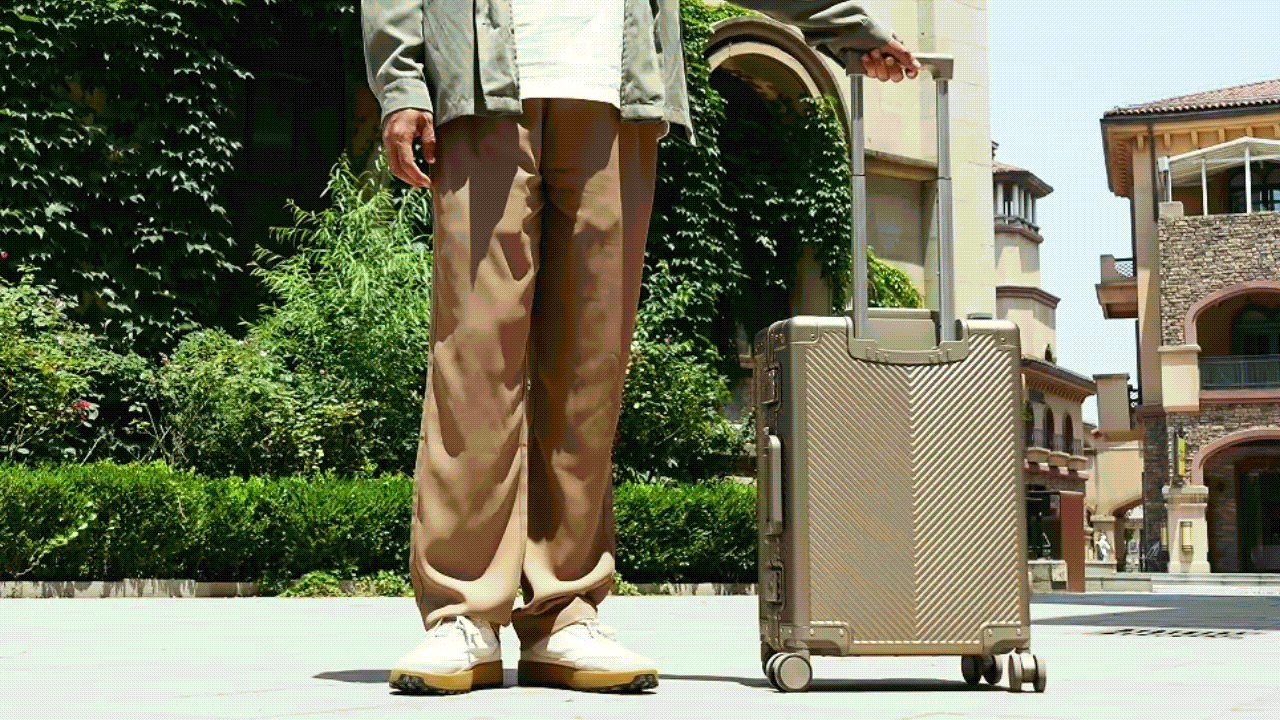 Titaner Voyager Waterproof Titanium Carry-On System spinning wheels