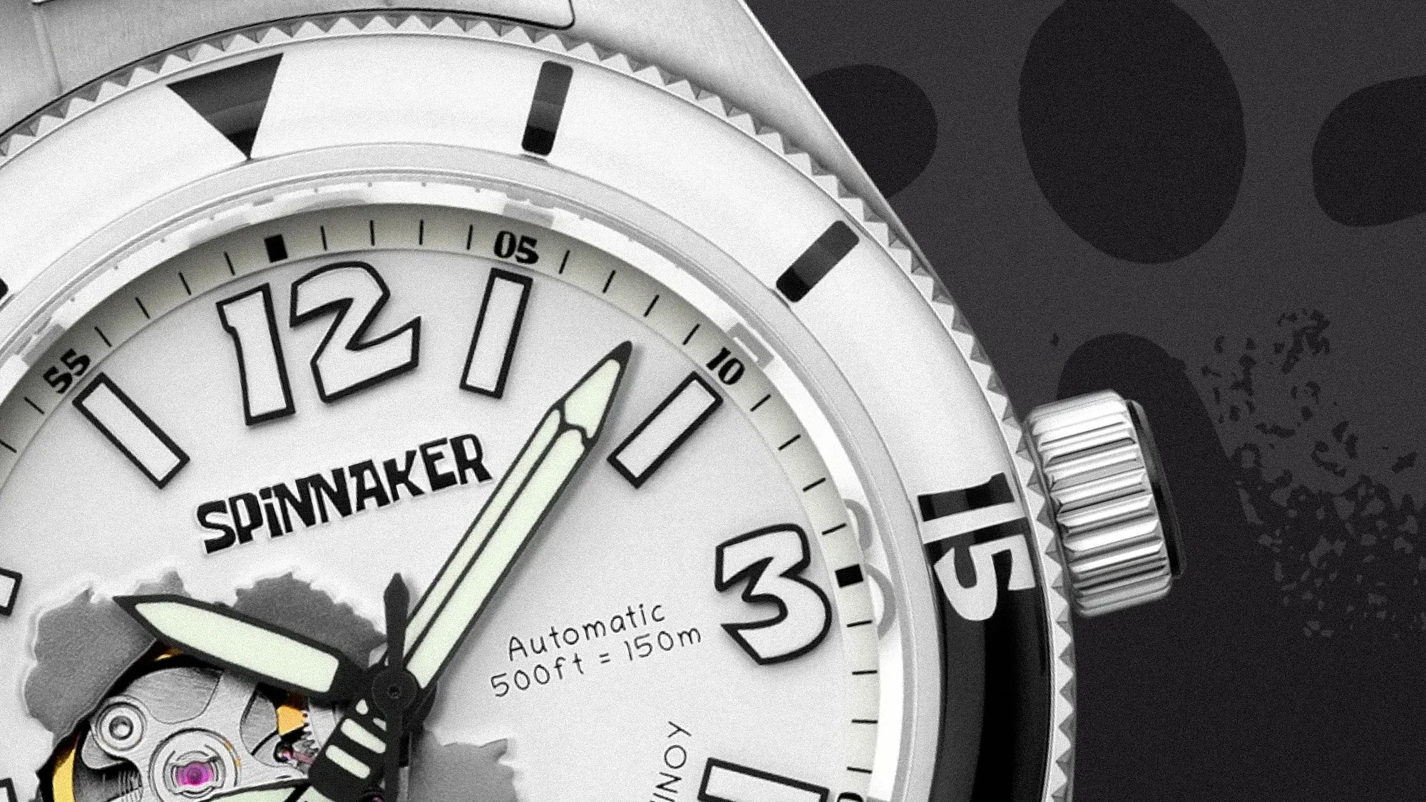 Close-up of a Spinnaker watch face showing luminous hands, partial mechanical movement, and water resistance text.