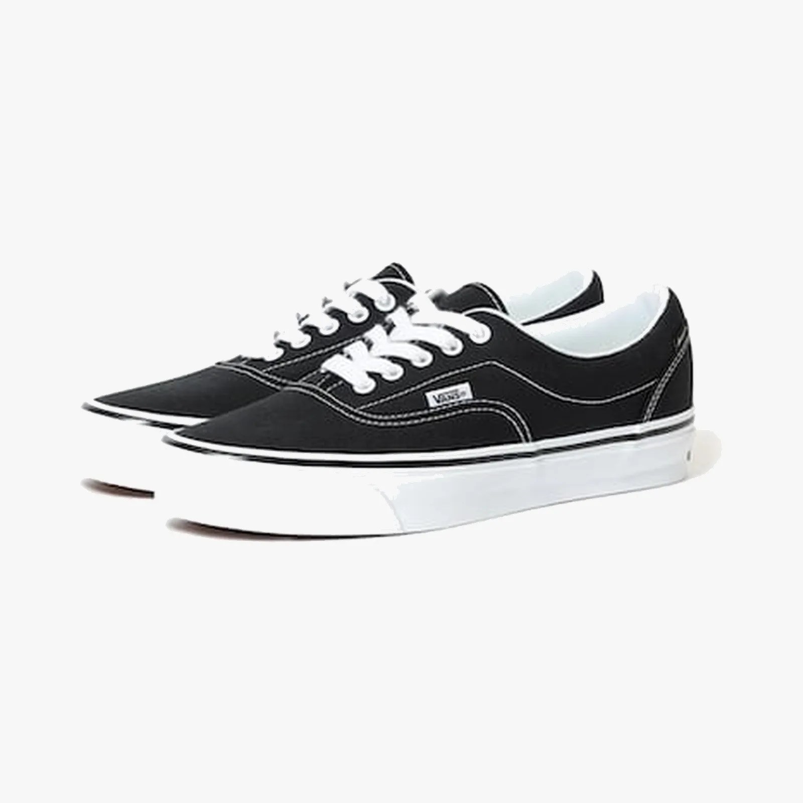 Pair of black Vans sneakers with white laces and white rubber soles on a white background.