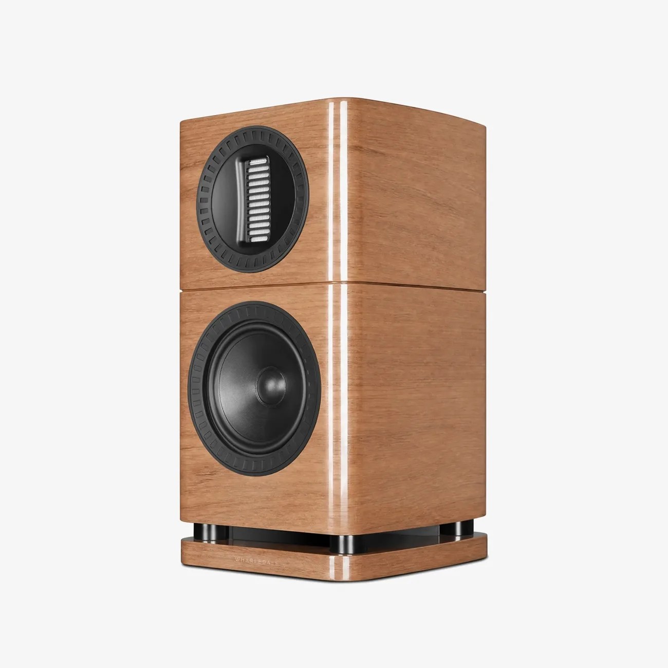 Glossy light brown wooden bookshelf speaker with black drivers and a square base.