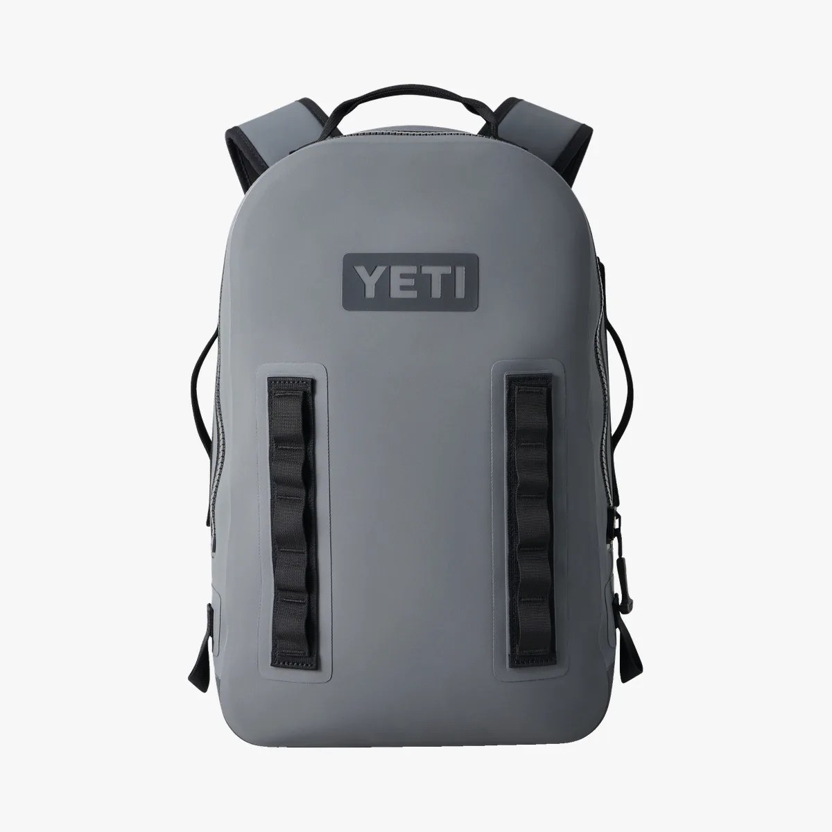 Gray YETI backpack with black straps and handle, featuring two vertical black loops on the front.