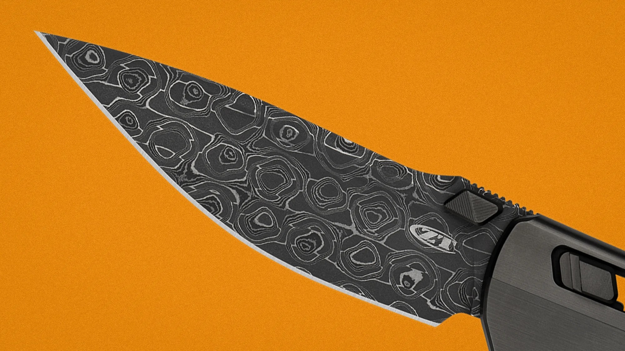 Close-up of a black Damascus steel knife blade with a patterned texture and a partially visible gray handle on an orange background.
