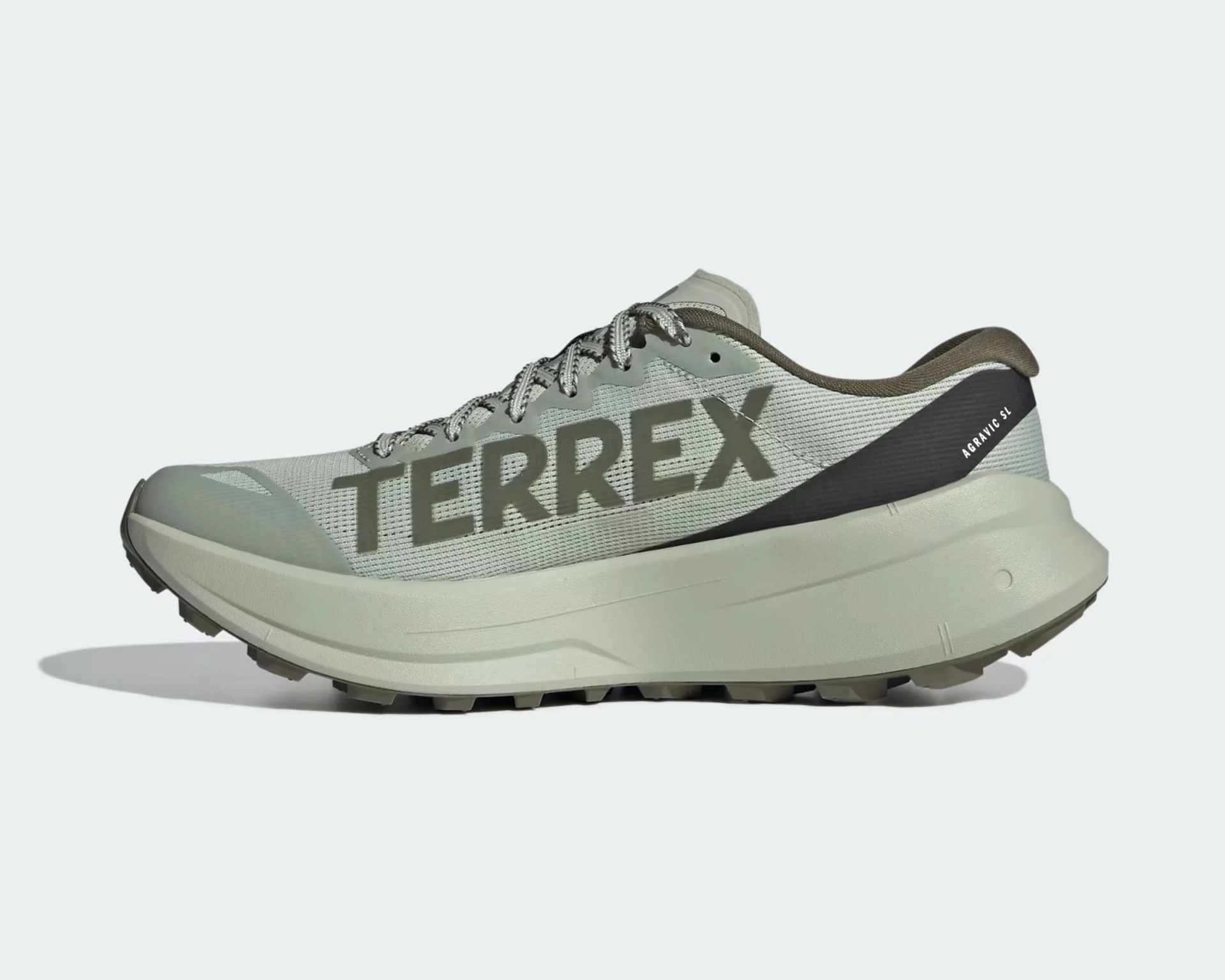 Light gray Adidas Terrex Agravic SL trail running shoe with dark gray accents and thick sole.