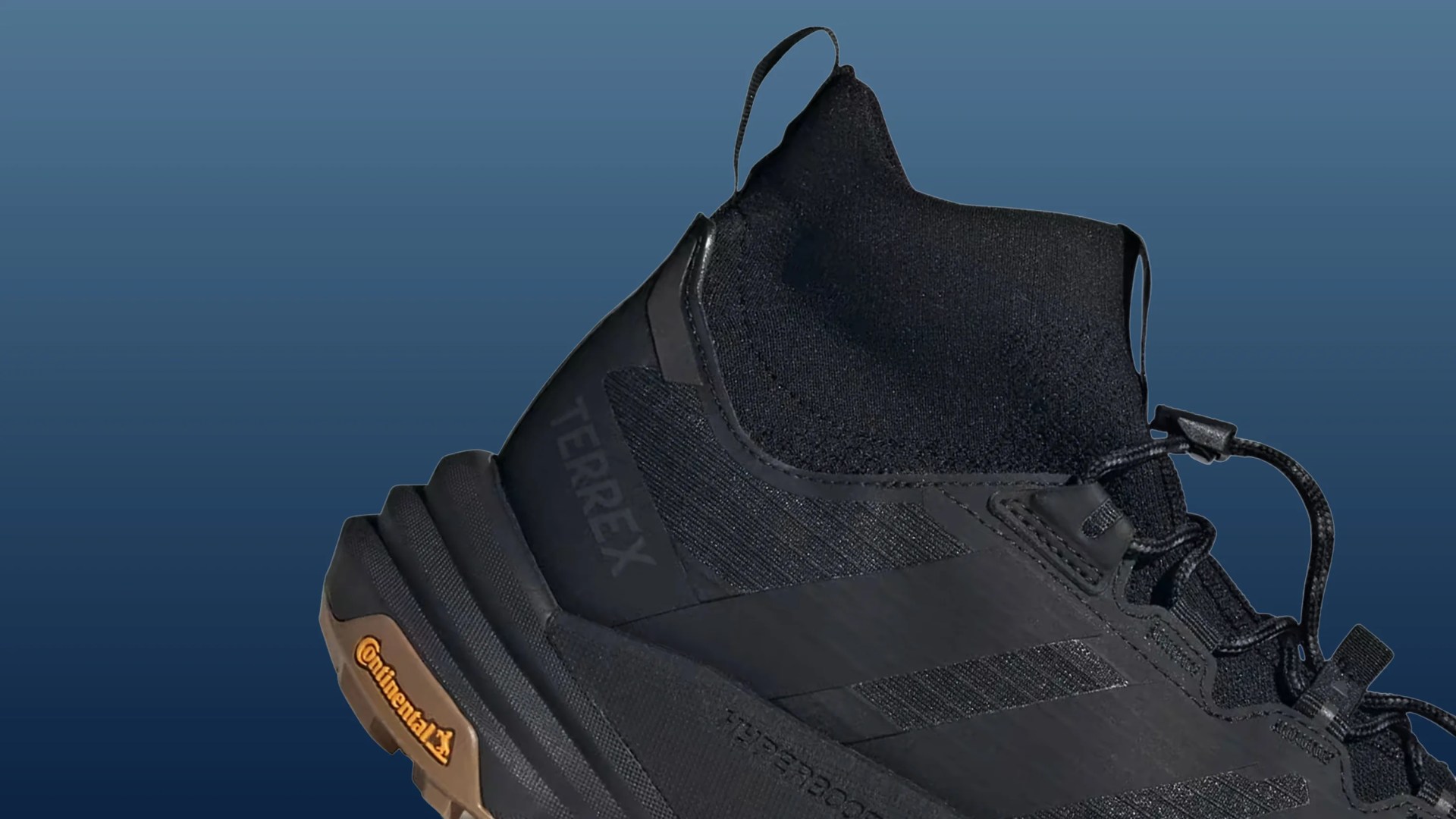 Black high-top Terrex hiking shoe with knit ankle collar and Continental rubber sole.