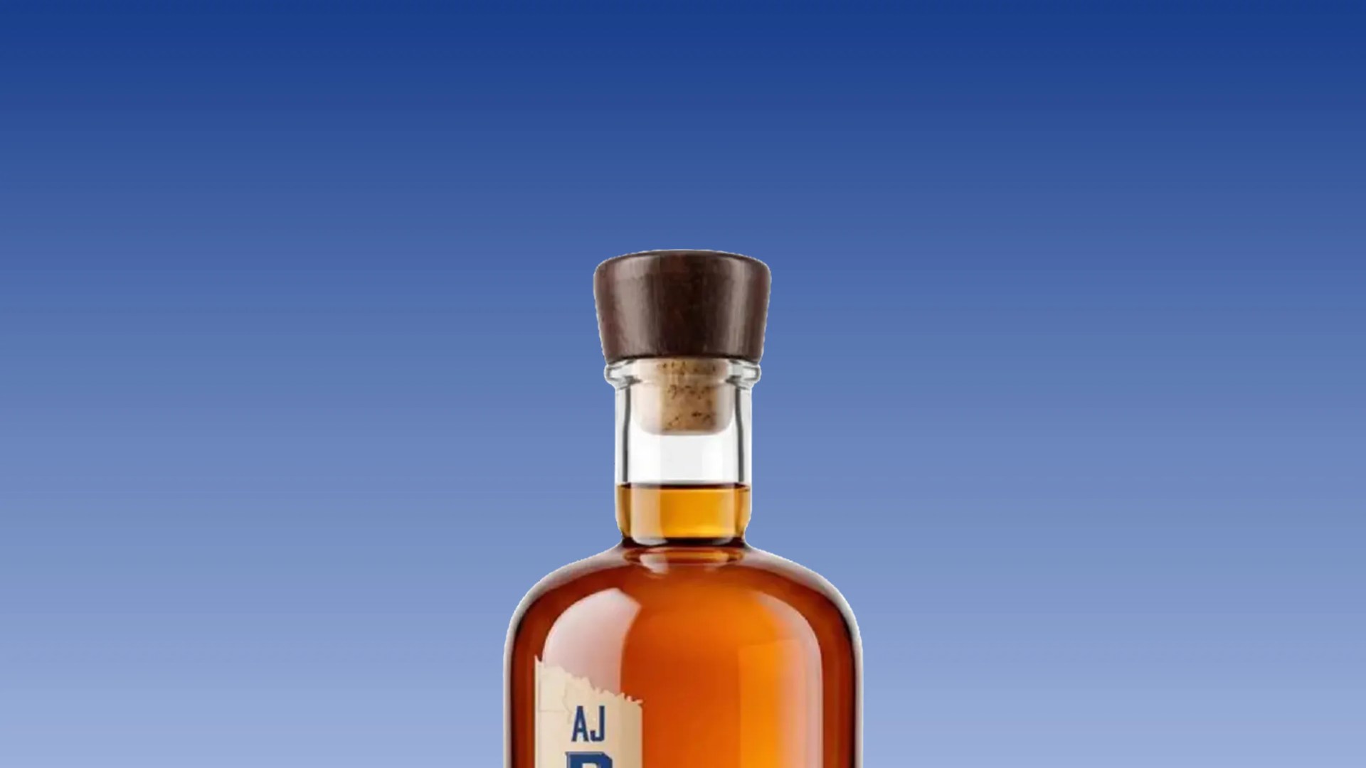 Top portion of an amber glass bottle with a cork and dark wooden stopper against a blue gradient background.
