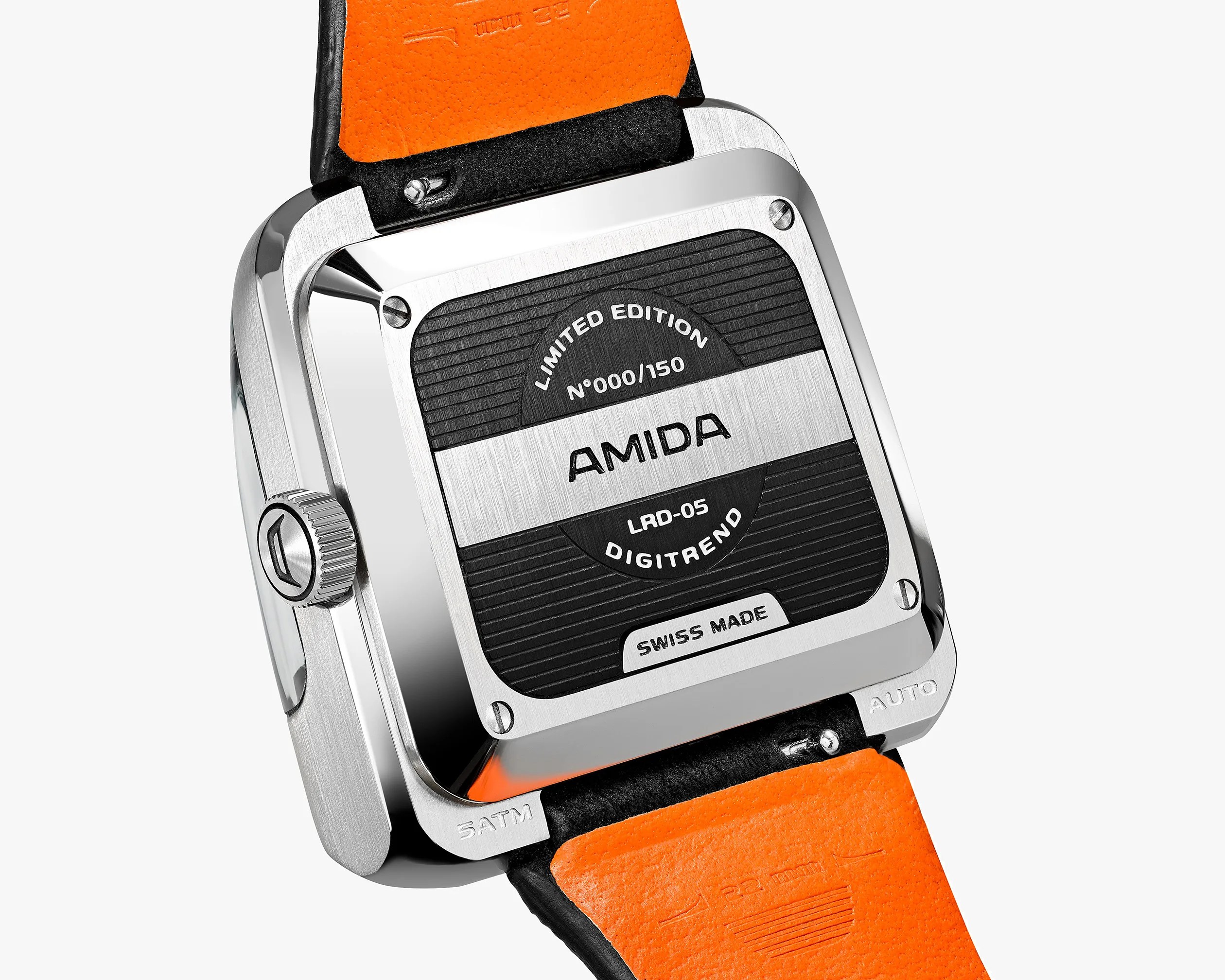 Close-up of the back of a silver Amida LRD-05 DigitRend limited edition watch with an orange leather strap.