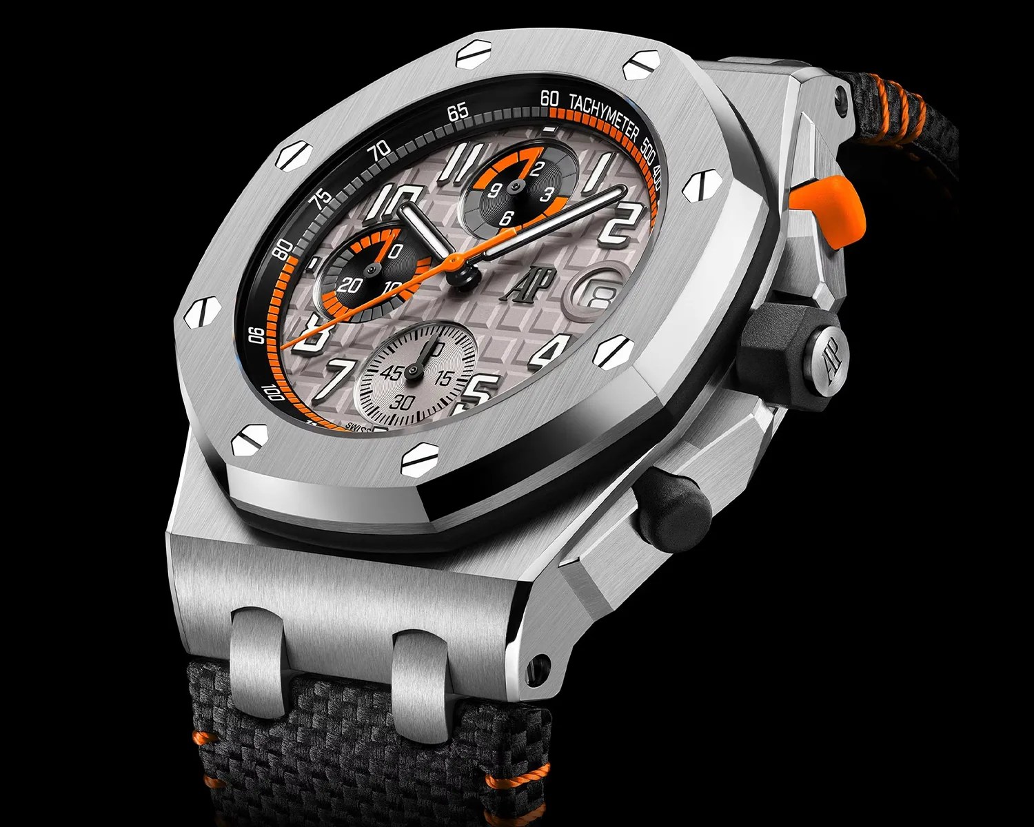 Silver stainless steel wristwatch with octagonal bezel, gray dial, orange accents, and black textured strap.