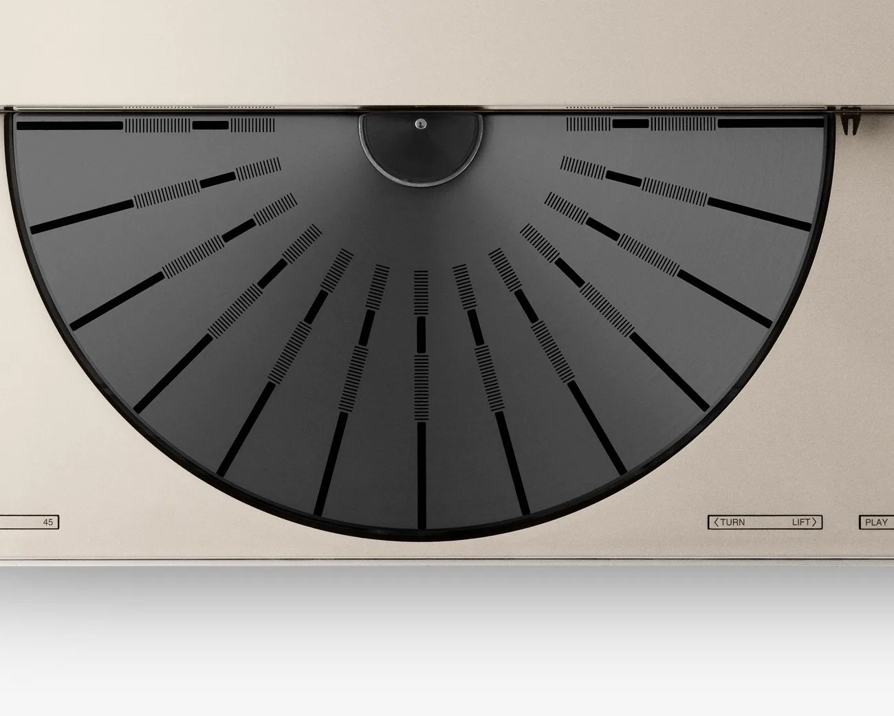Beige turntable with a black semi-circular platter and control buttons labeled "TURN," "LIFT," and "PLAY.