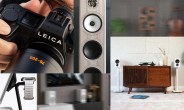 Collage showing a Leica camera with 70-200 lens, a tall wooden speaker with three drivers, a white smartwatch on a black stand, two white speakers on stands flanking a wooden cabinet with a turntable on top.