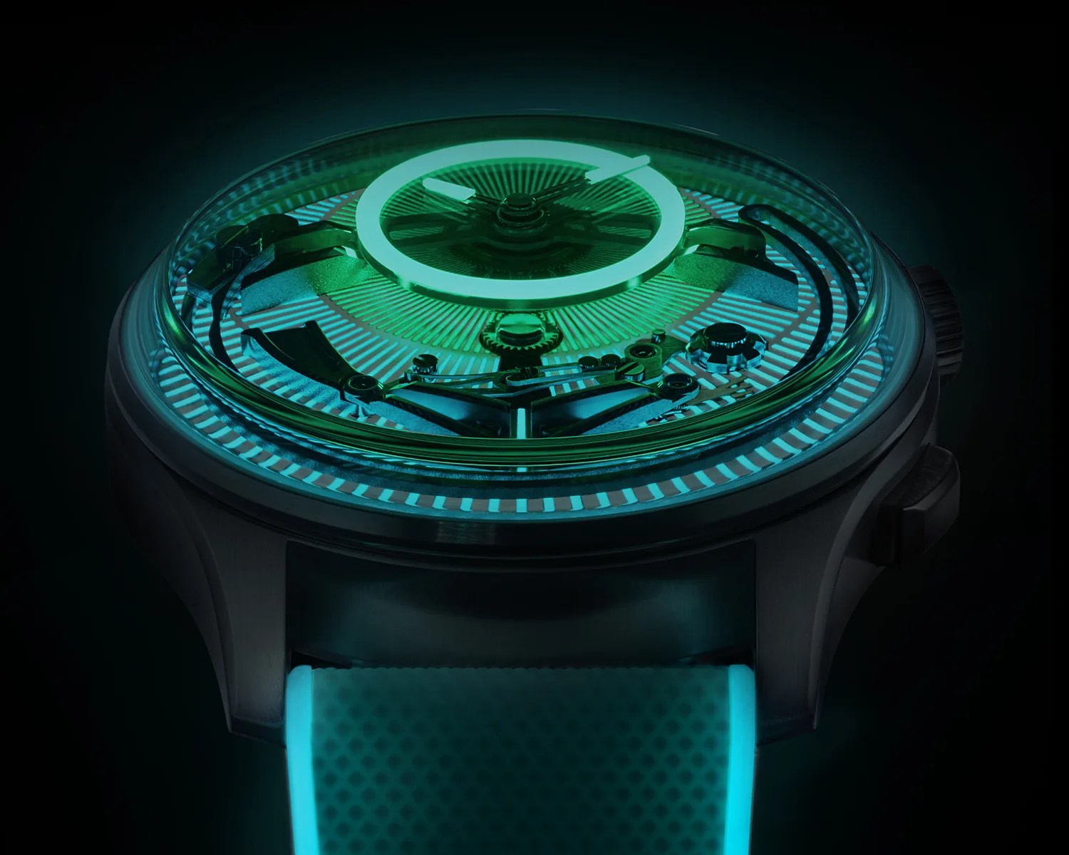 Close-up of a wristwatch with glowing green luminescent hands, markers, and a textured strap in low light.