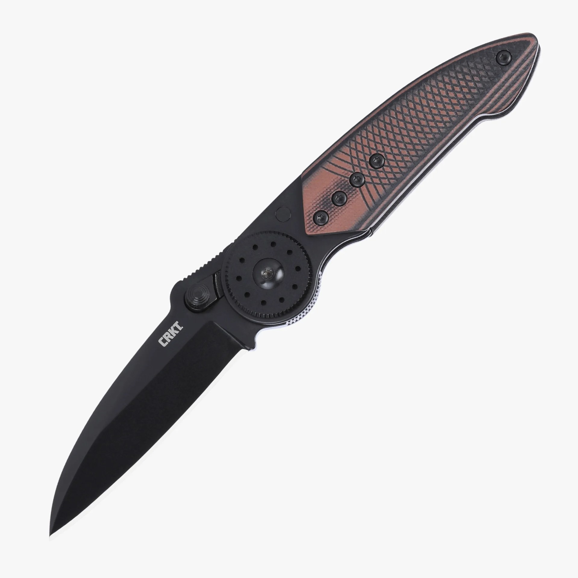 Black folding knife with textured brown and black handle and circular pivot mechanism.