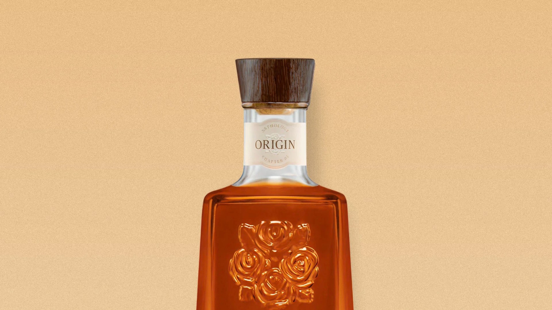 Amber glass bottle with embossed roses and a wooden cap labeled "Origin" on a beige background.