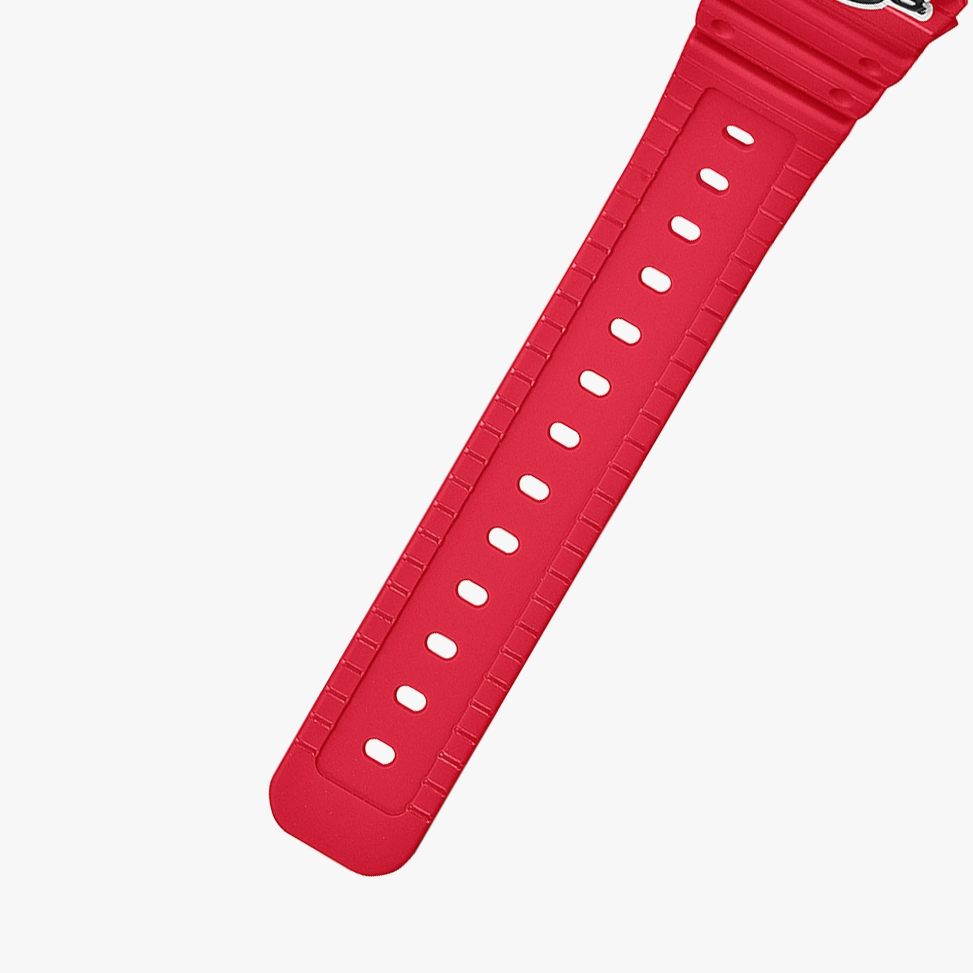 Red rubber watch strap with rectangular adjustment holes and textured edges.