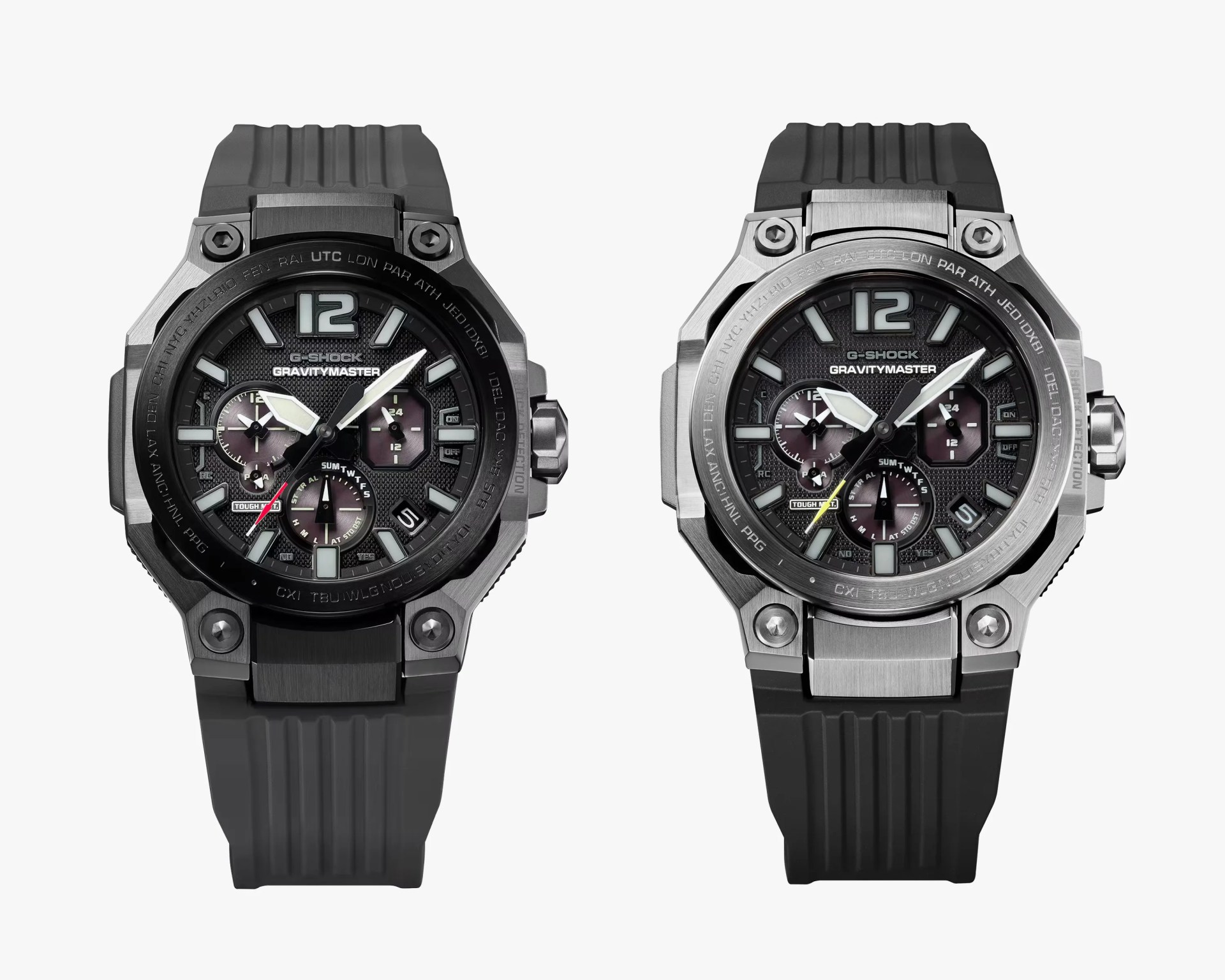 Two G-Shock Gravitymaster watches side by side, both with black dials, large white hour markers, and black rubber straps, one with a black bezel and the other with a silver bezel.